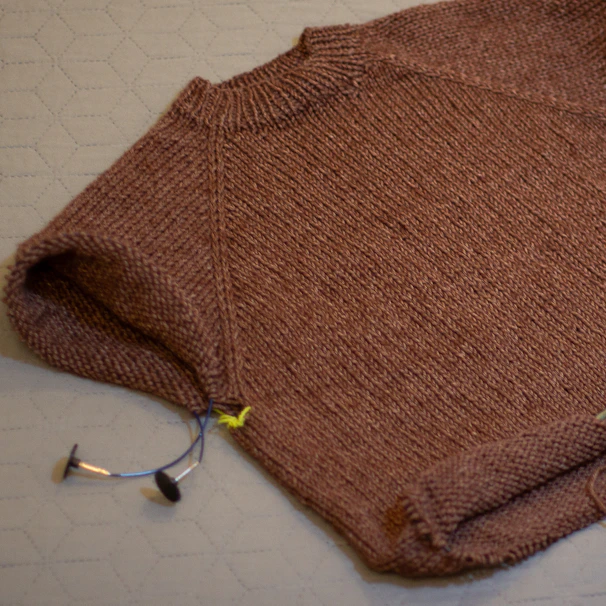Brown knitted sweater with drawstring details