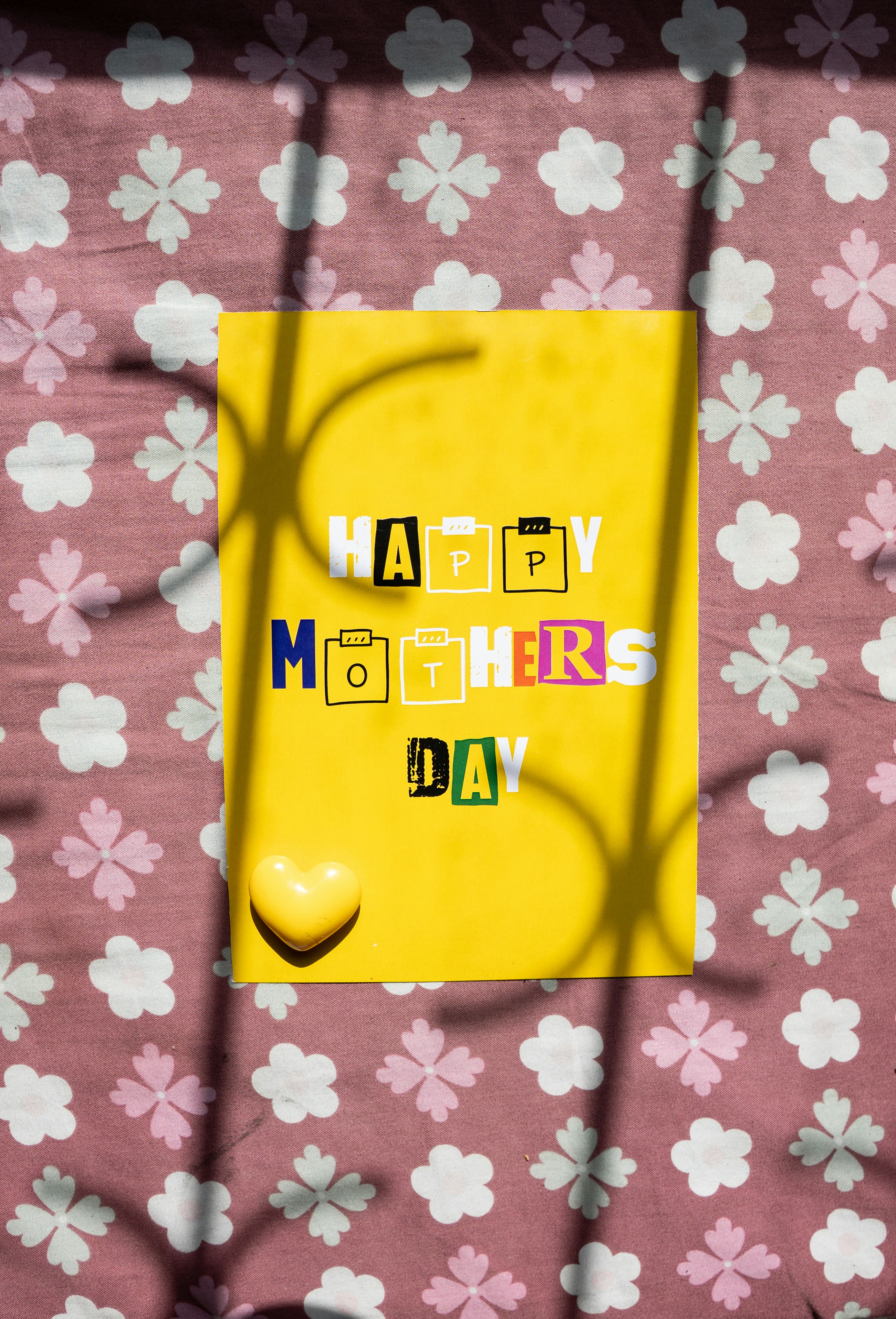 Yellow card with "happy mothers day" and heart