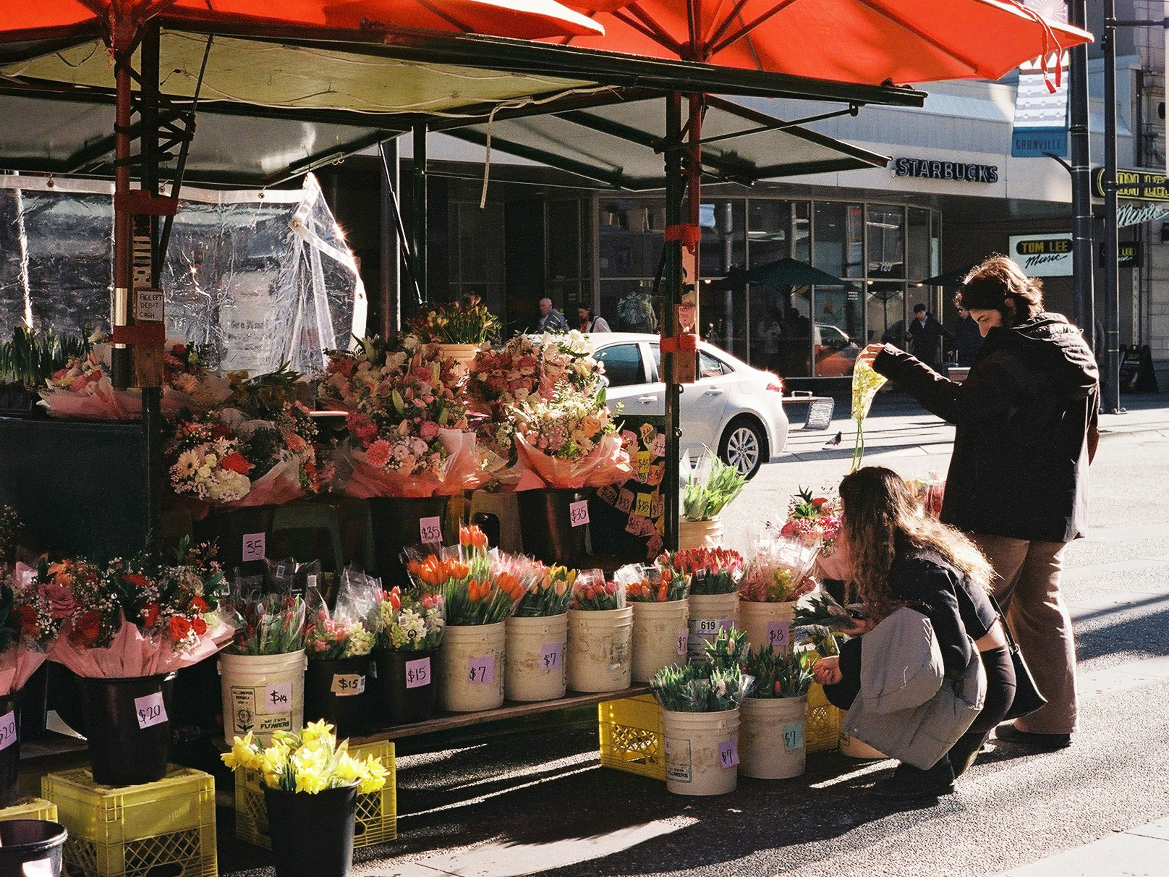 Street scene with layered pedestrians and urban motion