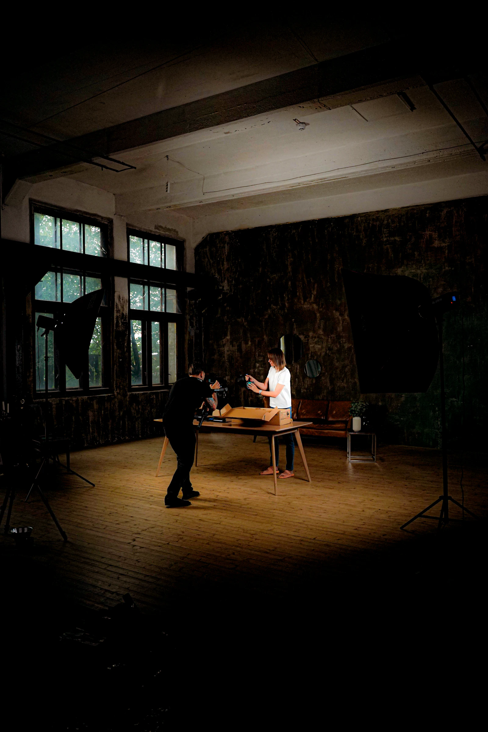 A studio product shoot with lights and camera equipment
