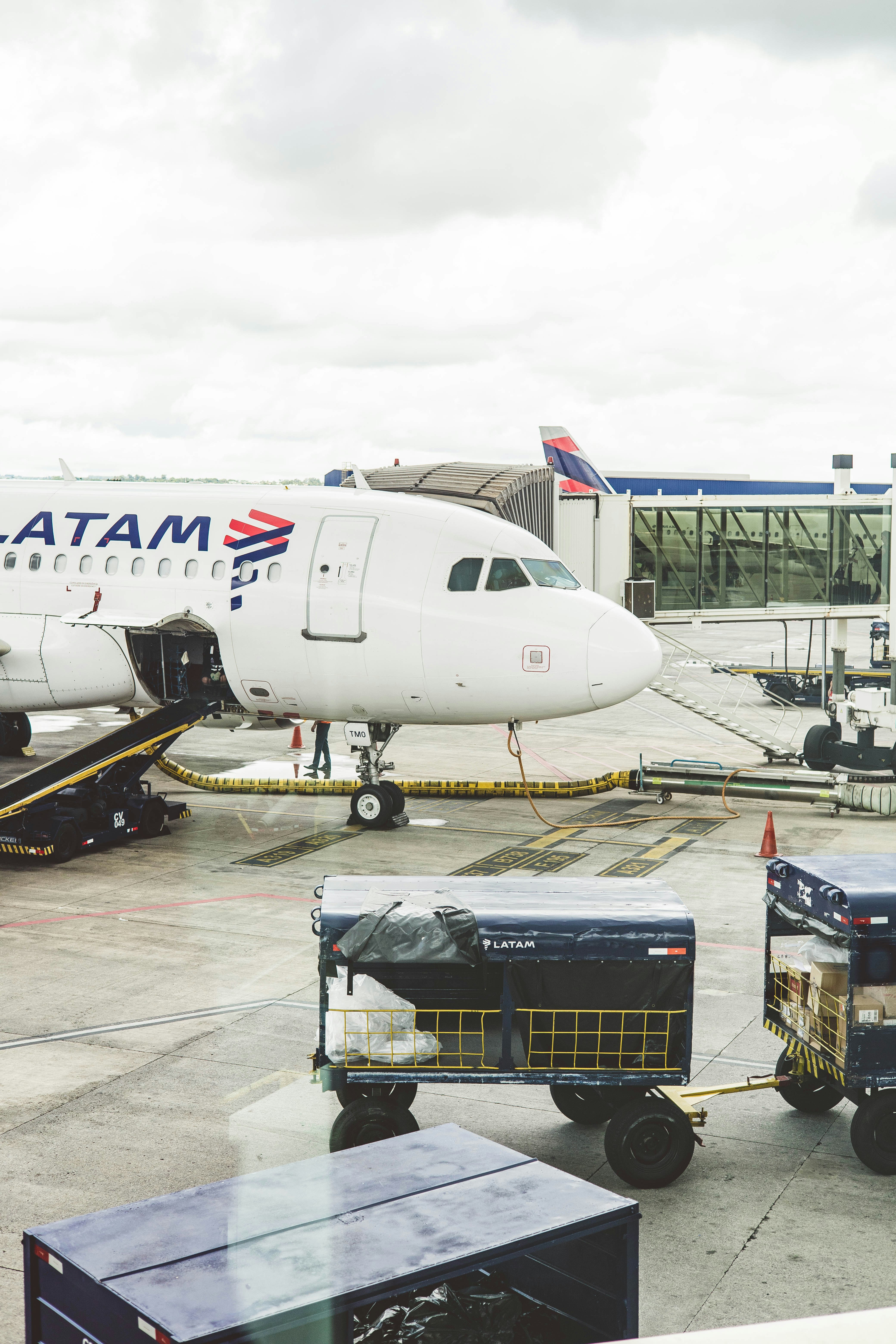 Traveler reviewing documents while choosing international travel insurance before departure