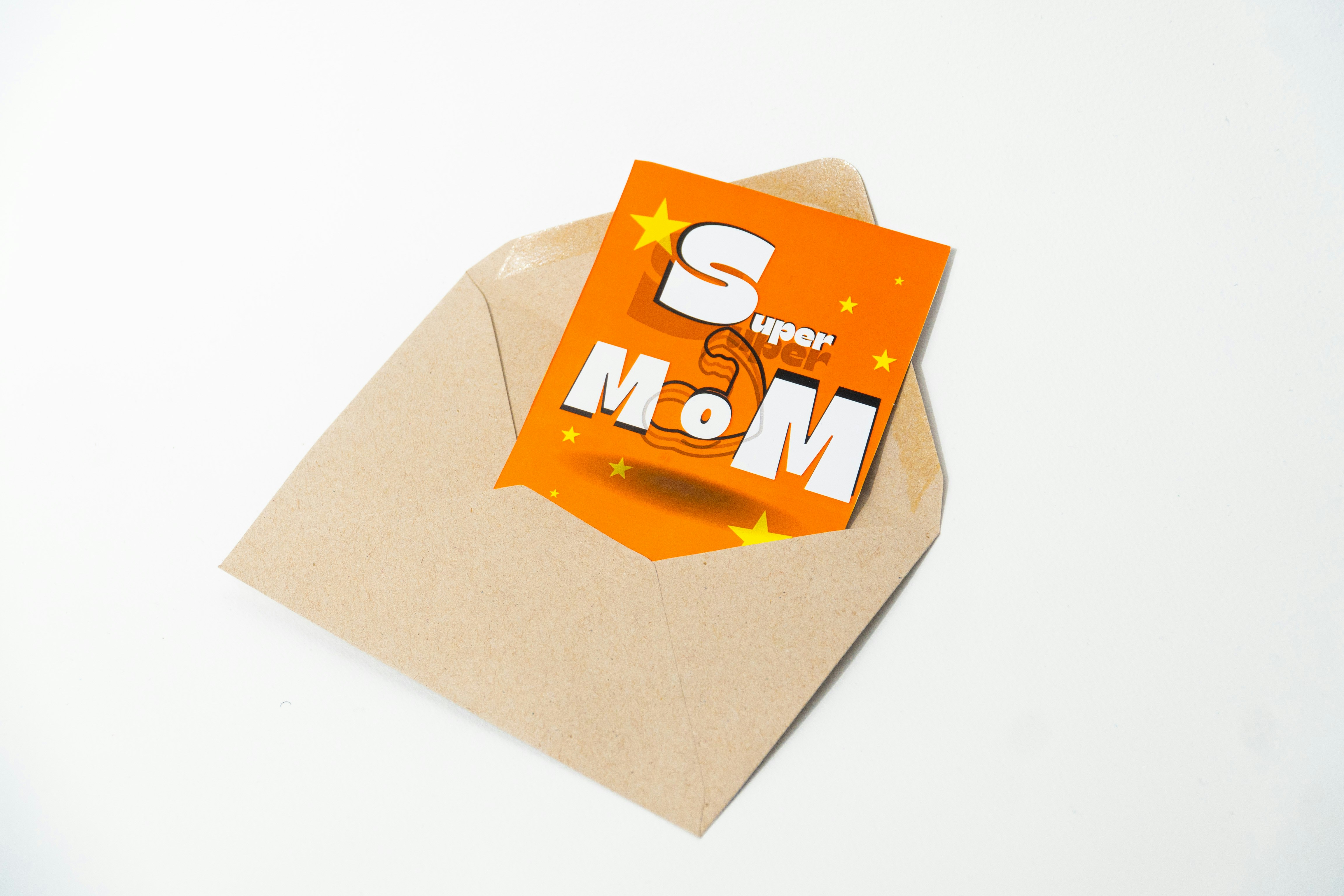 Super mom card in a brown envelope