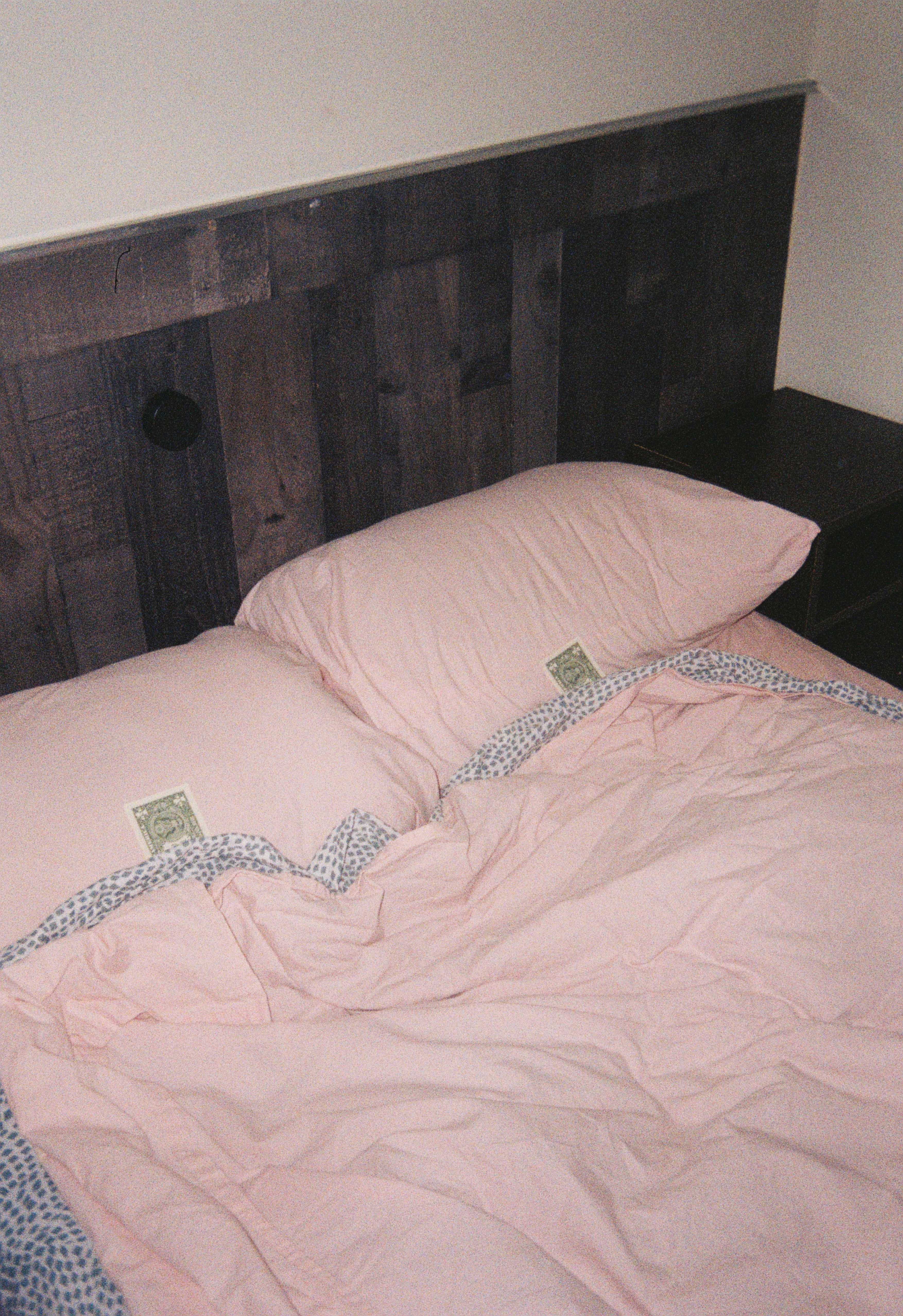 DIY headboard ideas featuring a handmade wooden bedroom design