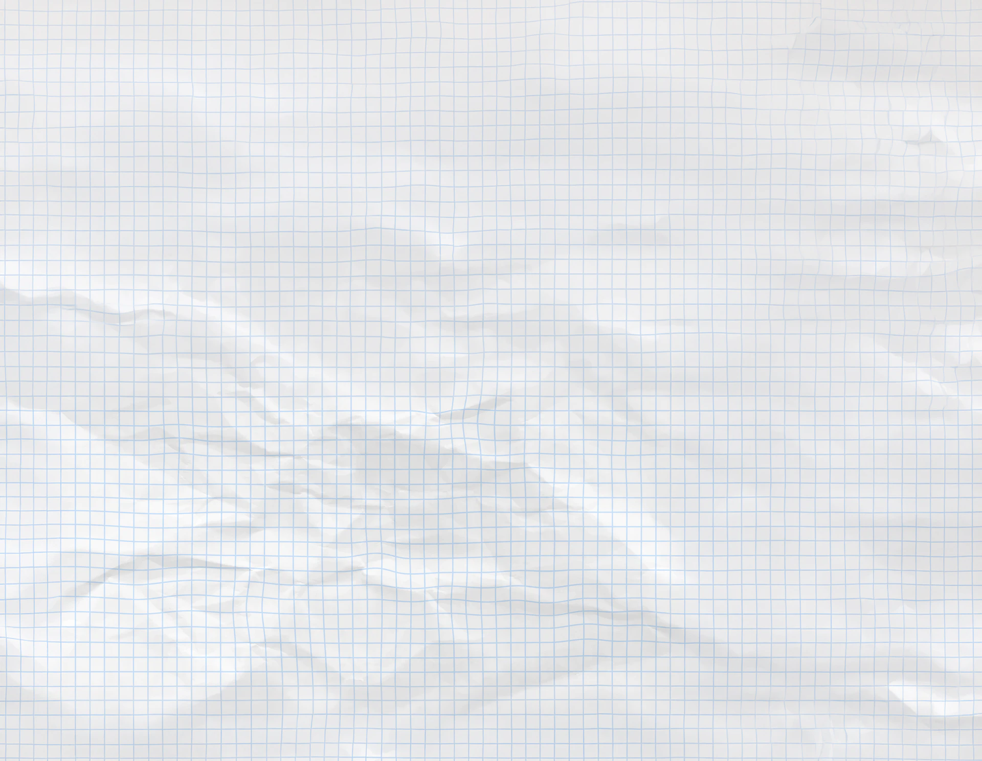 Crumpled white paper with a grid pattern