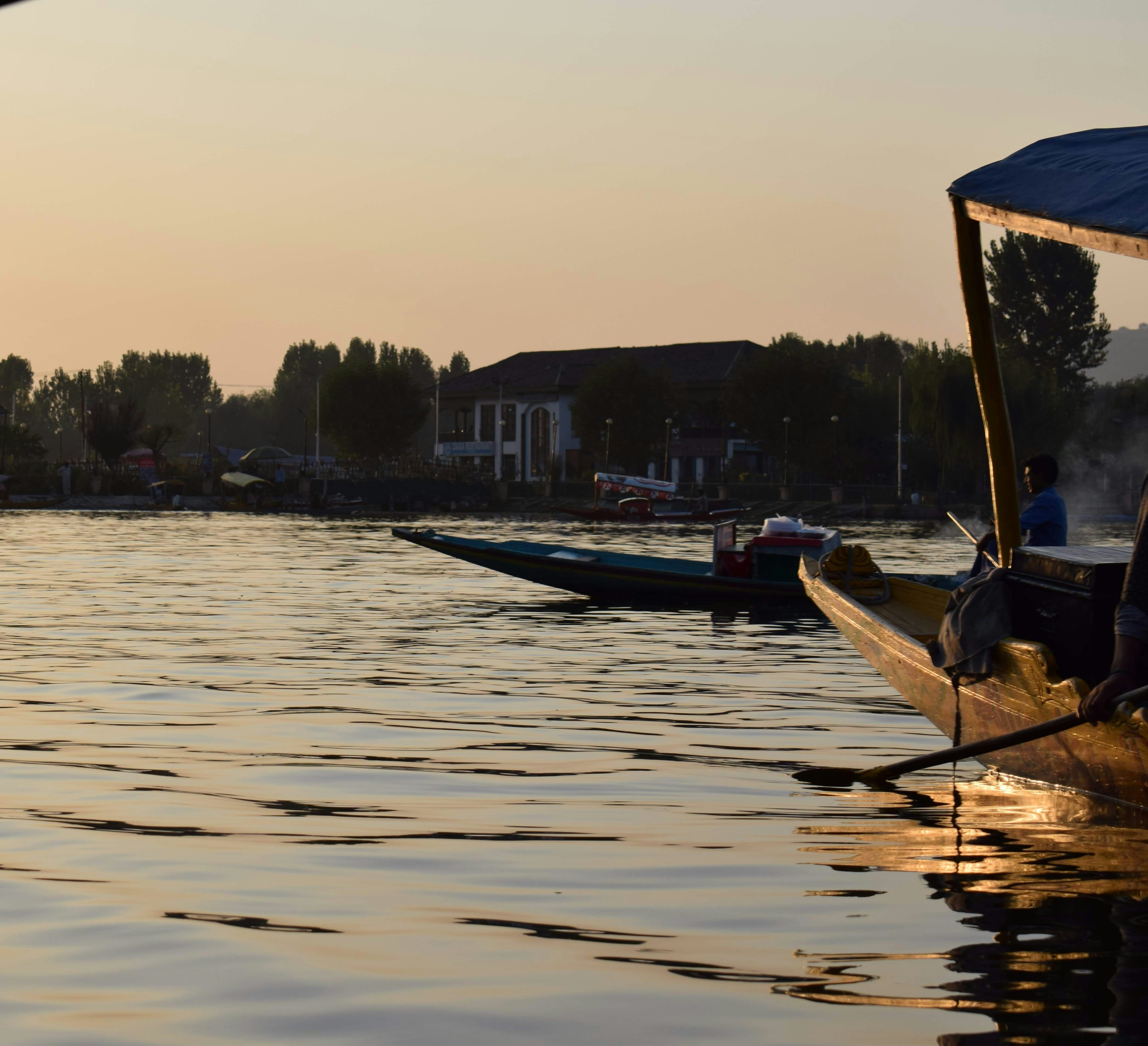 Boats on a lake at sunset