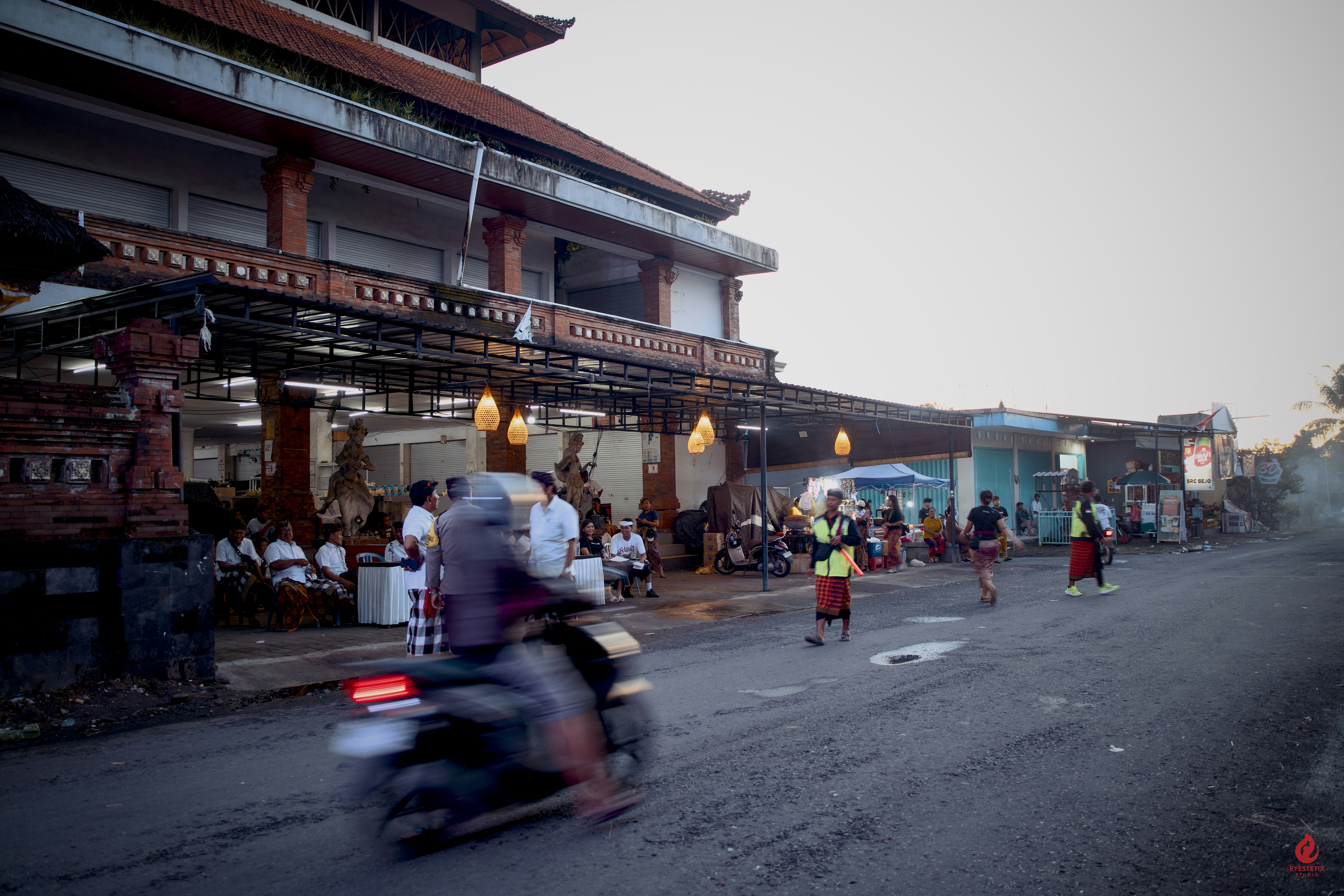 Bali traffic scooters sunset
