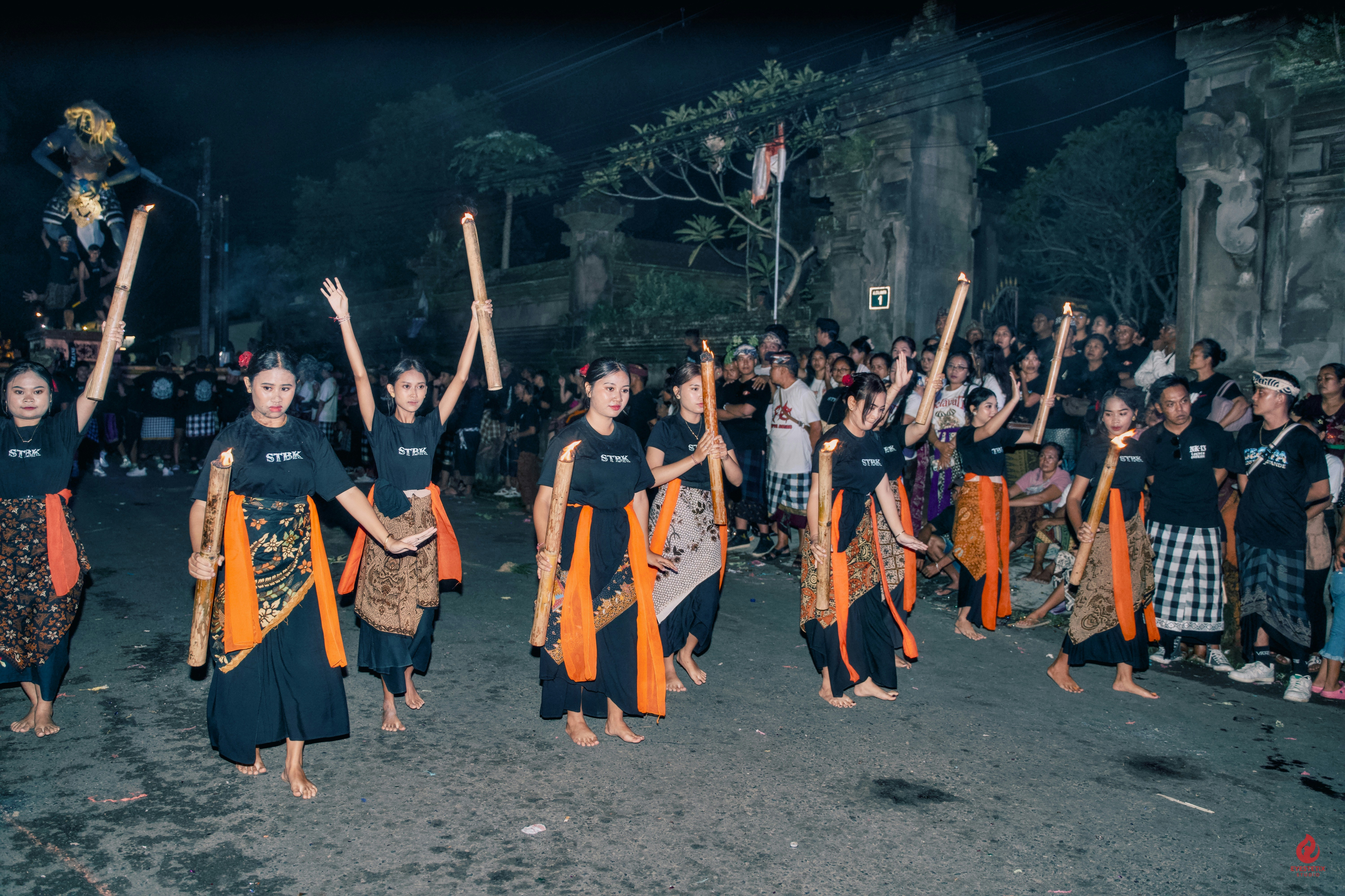 Group of people performing a ritual with sticks at night photo – Free ...