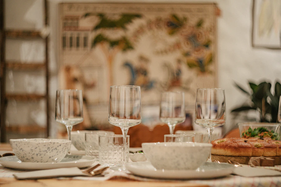 A table set for a meal with plates and glasses