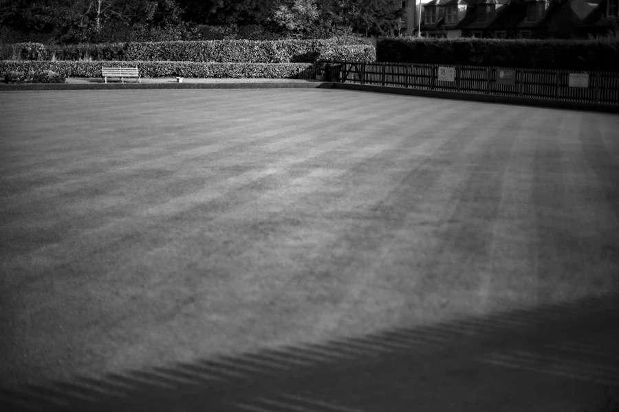 Manicured bowling green with striped mowing pattern
