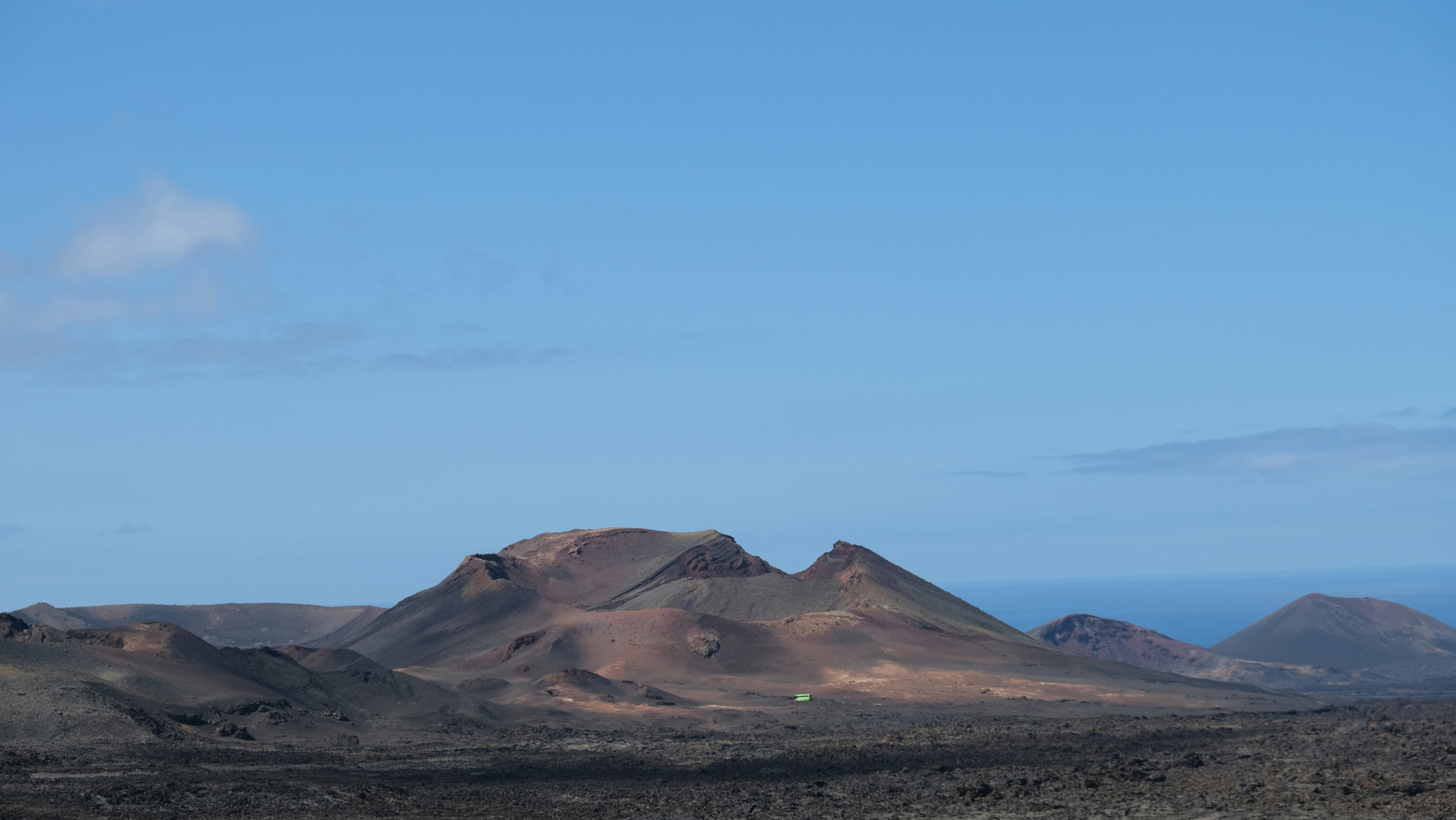 Volcanic landscape under a clear blue sky