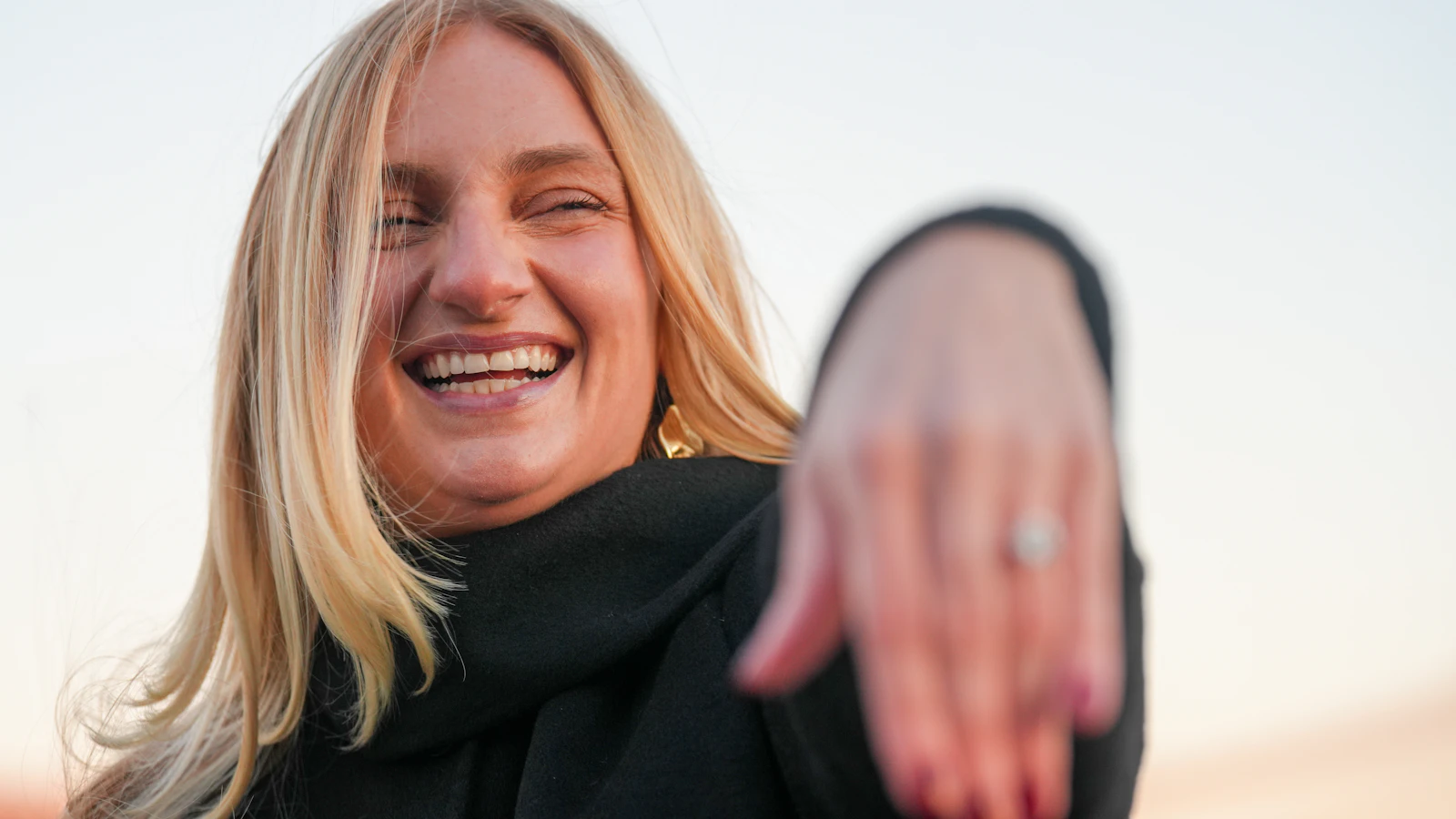 Olivia showing her engagement ring