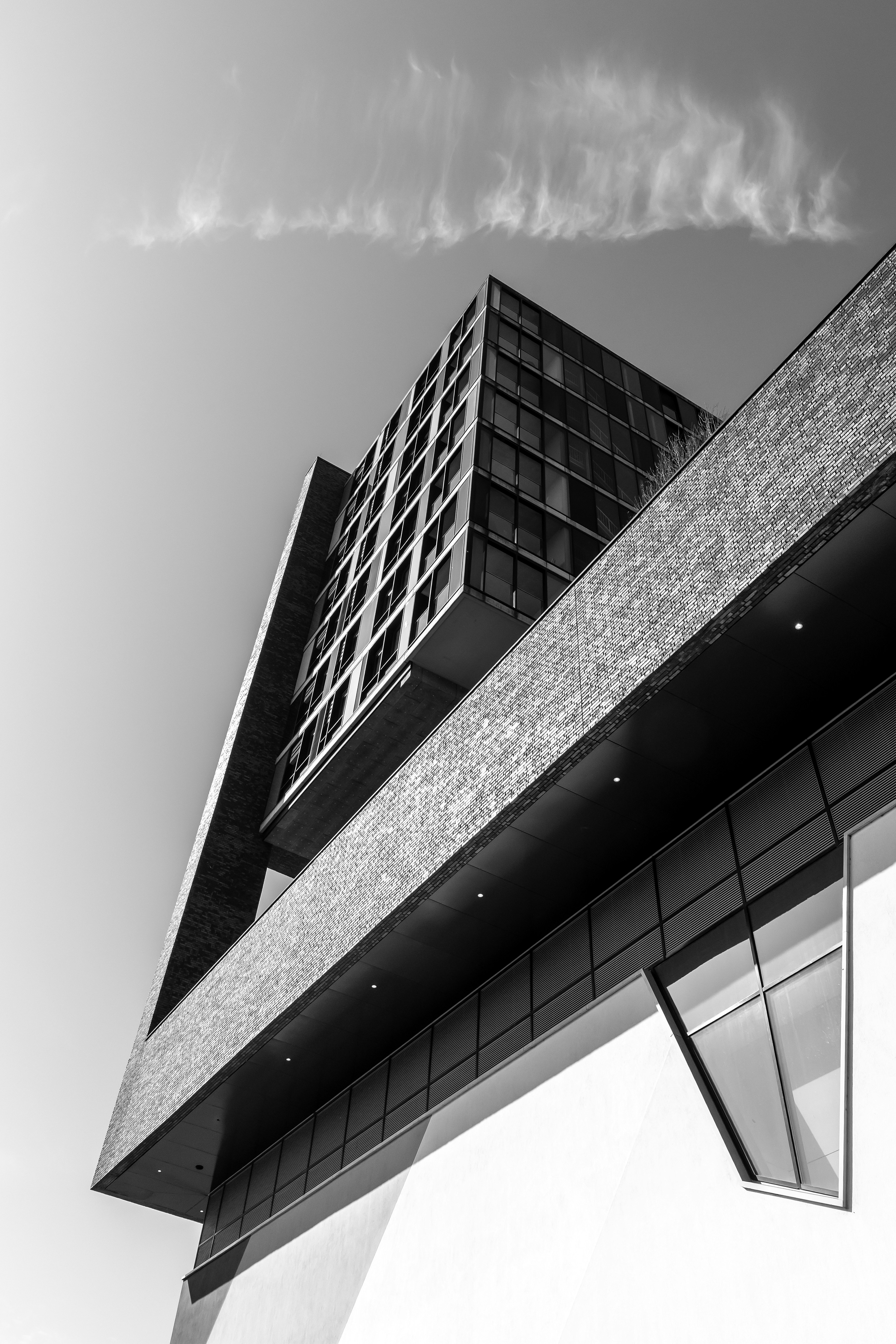 Modern building with geometric angles against sky