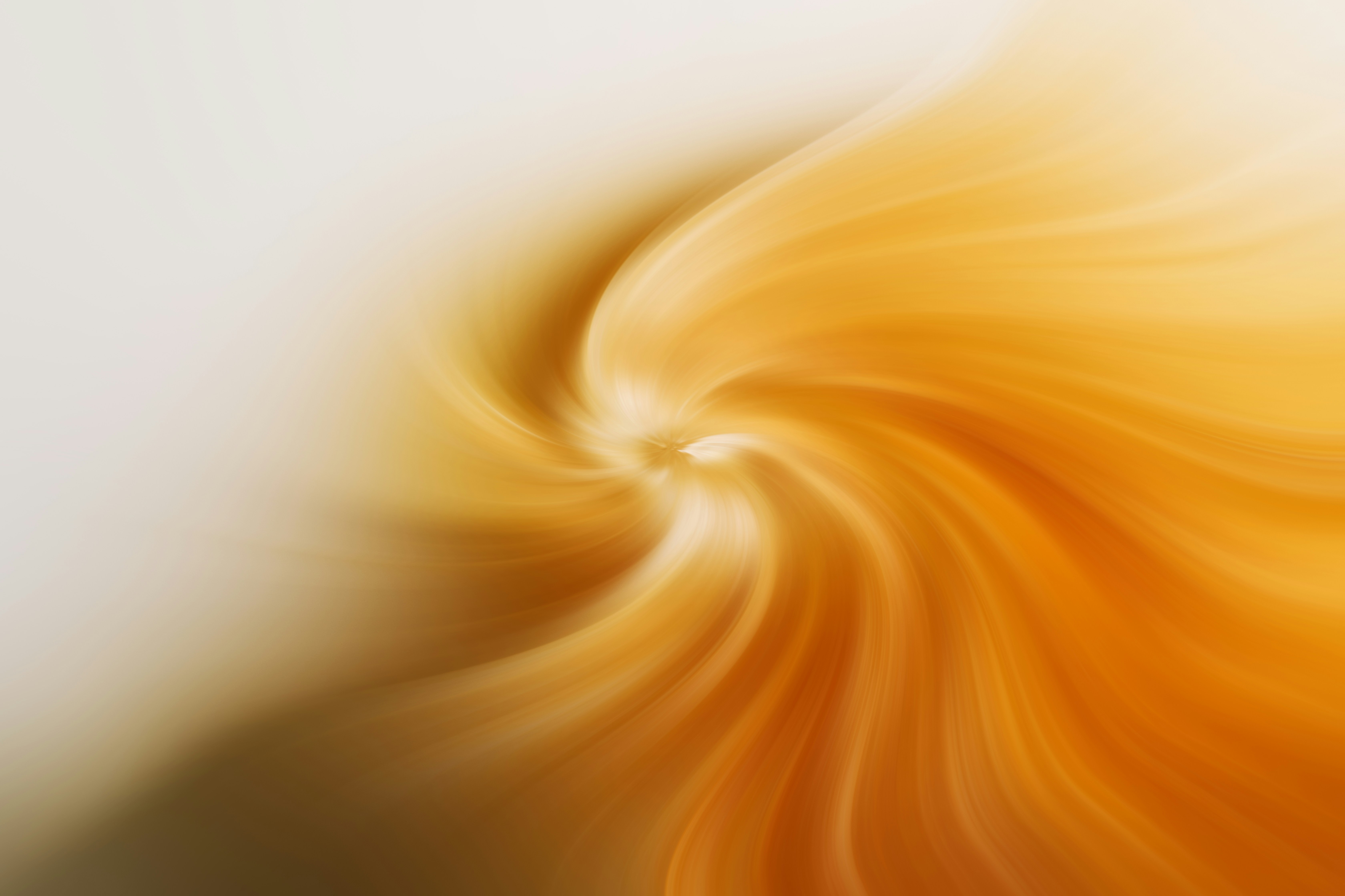 Abstract swirl of orange and white light