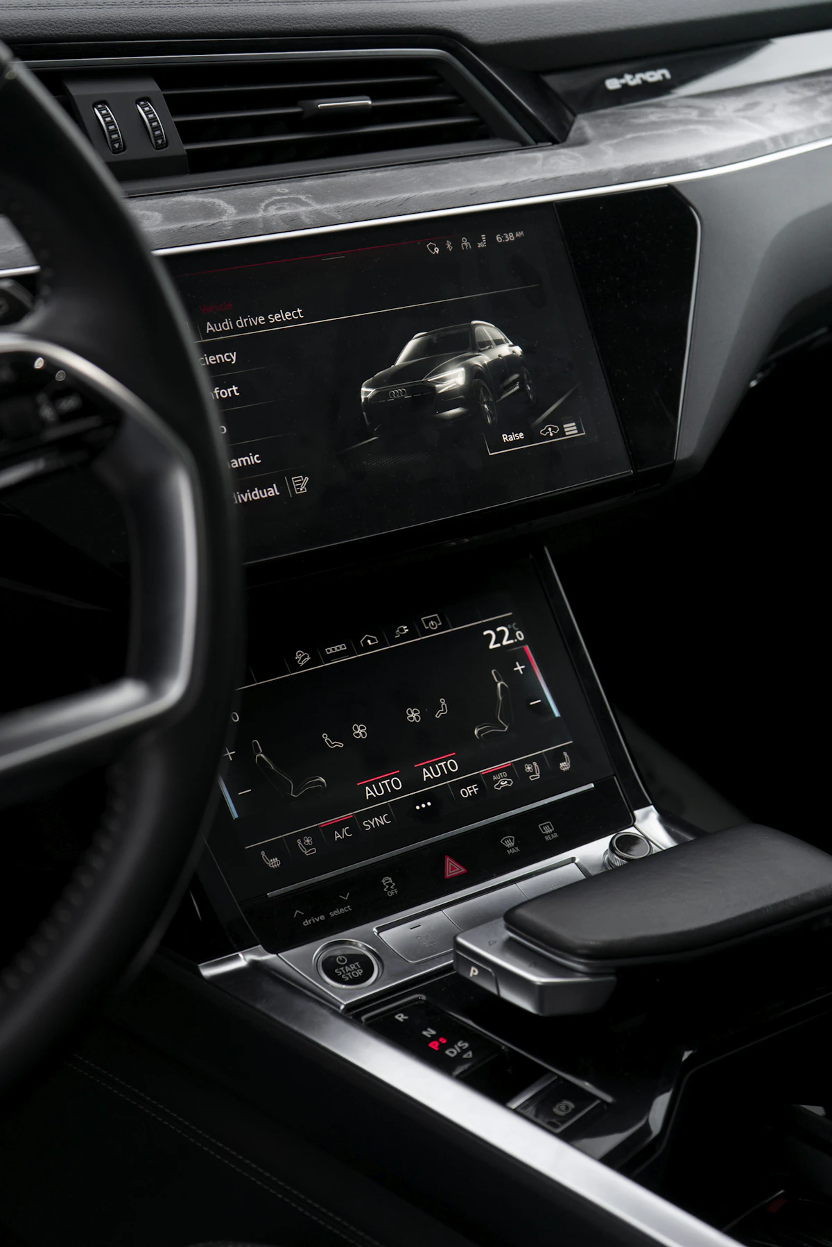 Real modern automotive dashboard with digital displays and infotainment technology