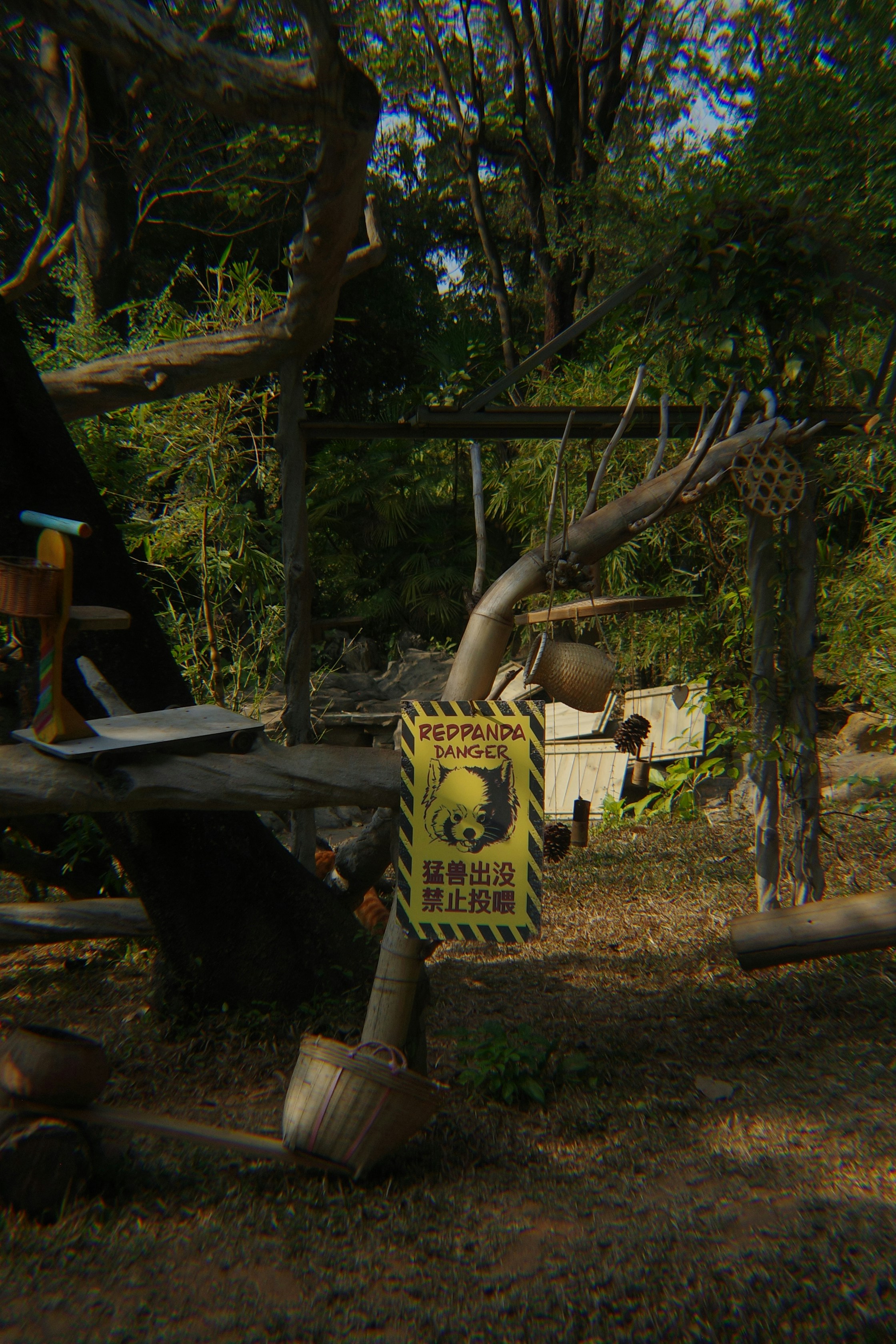 Red panda enclosure with warning sign