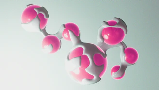 Abstract pink and white organic shapes connected together