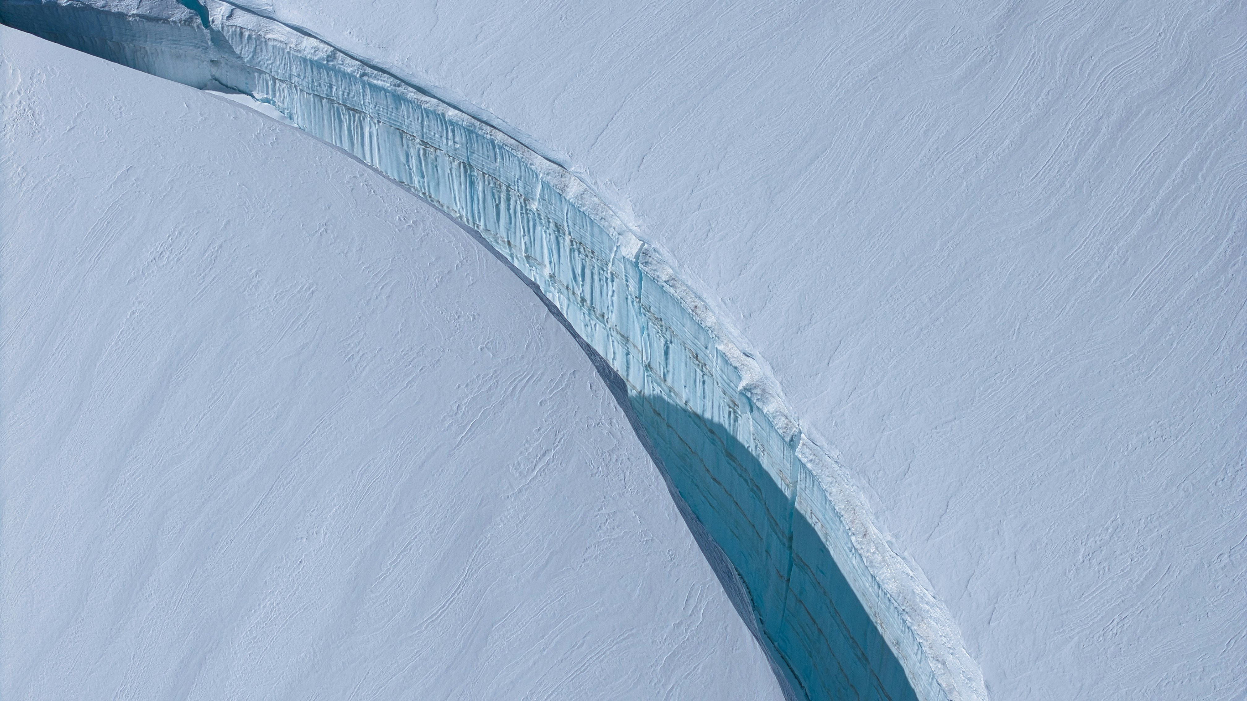A dramatic ice formation with blue glacial ice