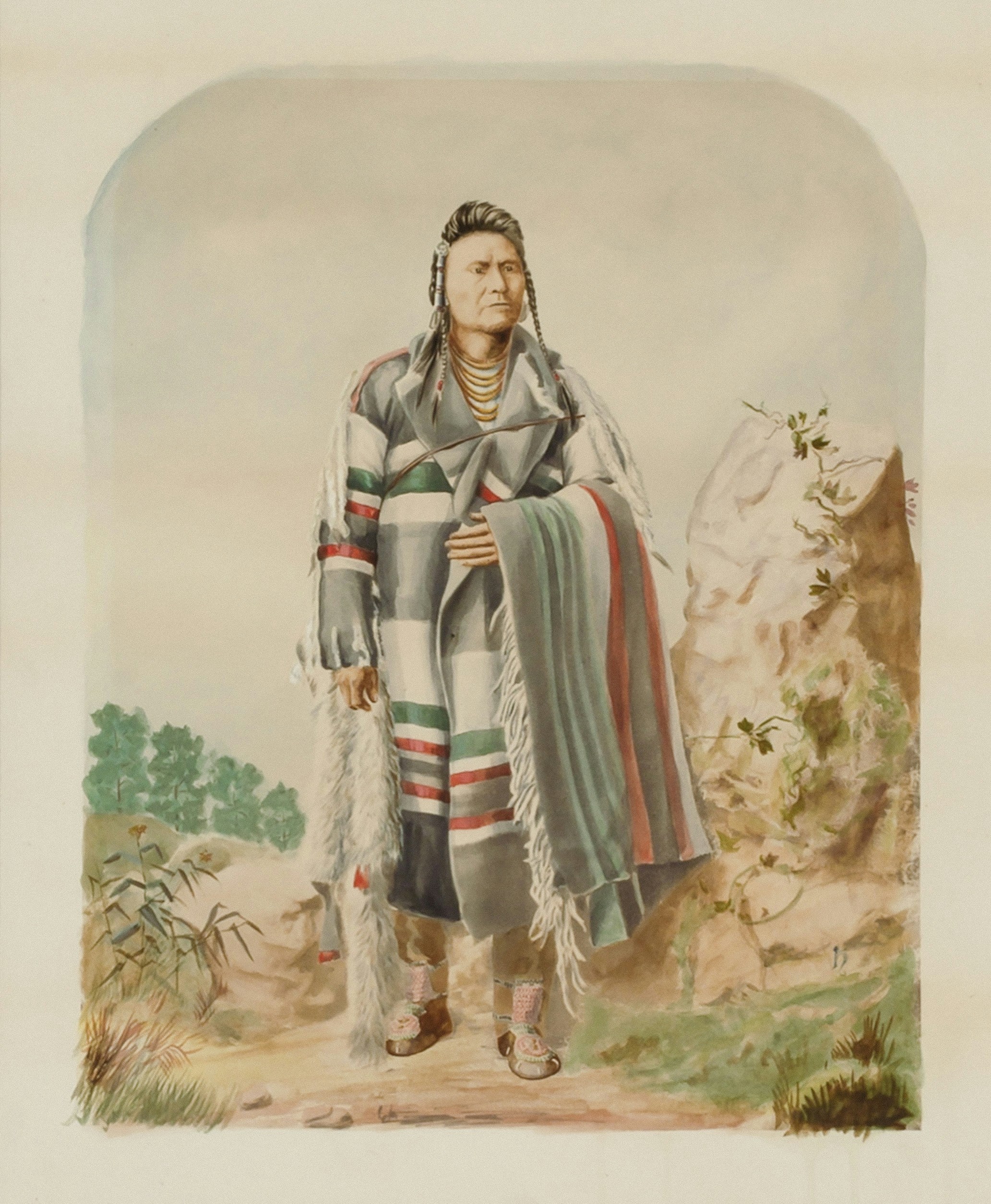 Hombre nativo americano con ropa tradicional y manta