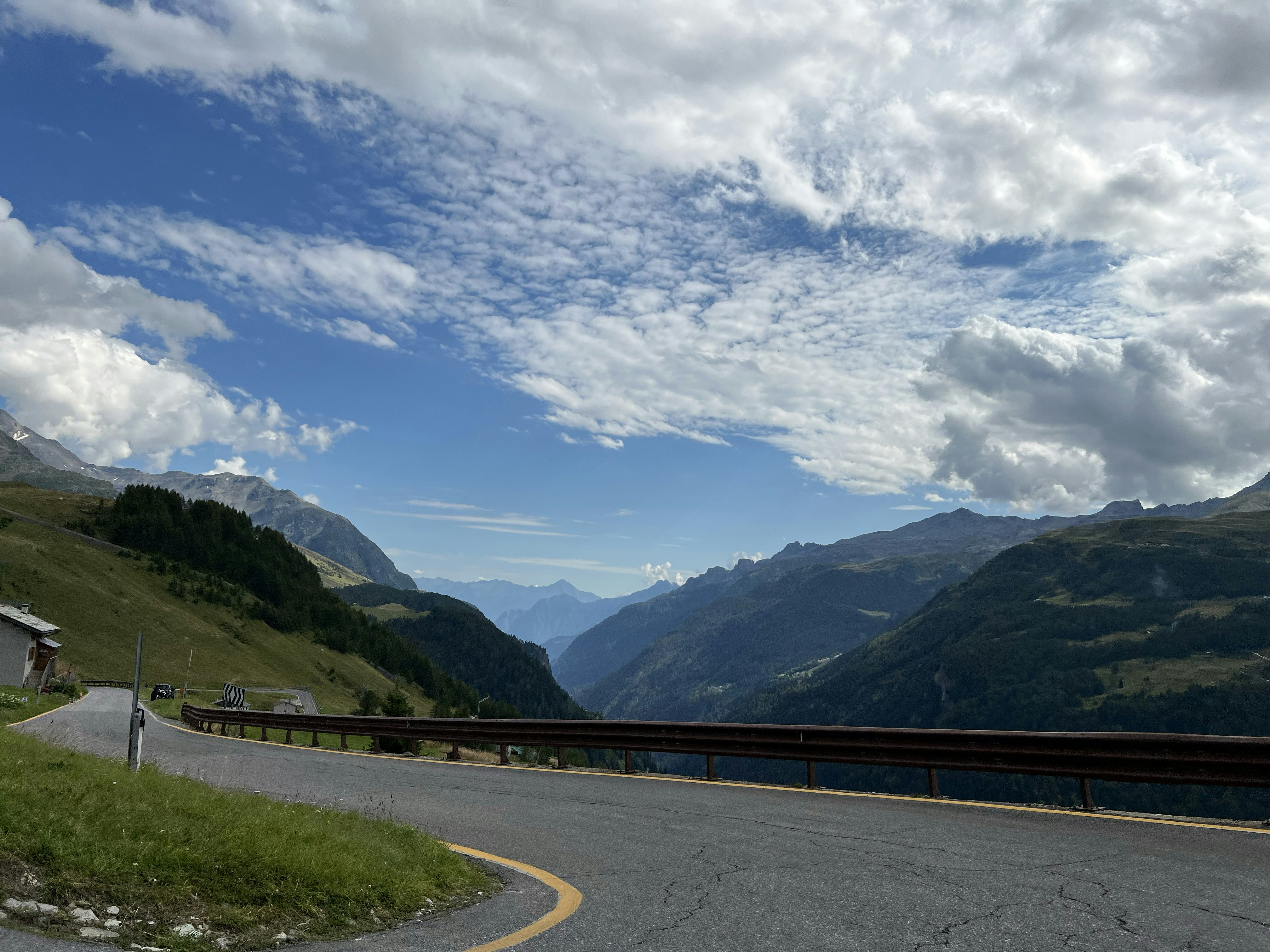 Winding mountain road with scenic valley view