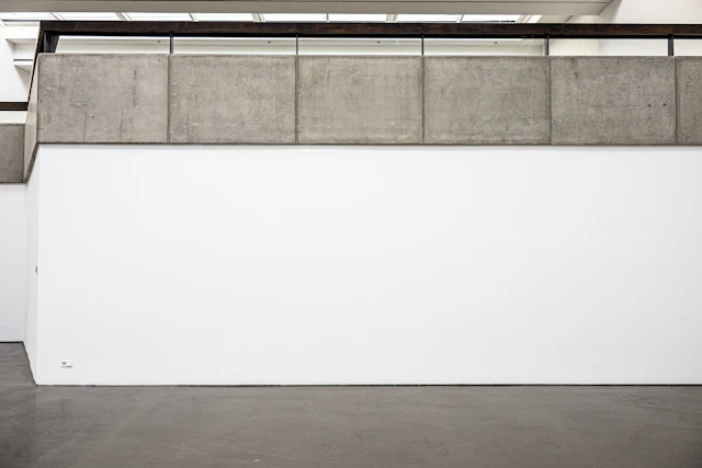 Large plain wall finish — illustrative stock photograph