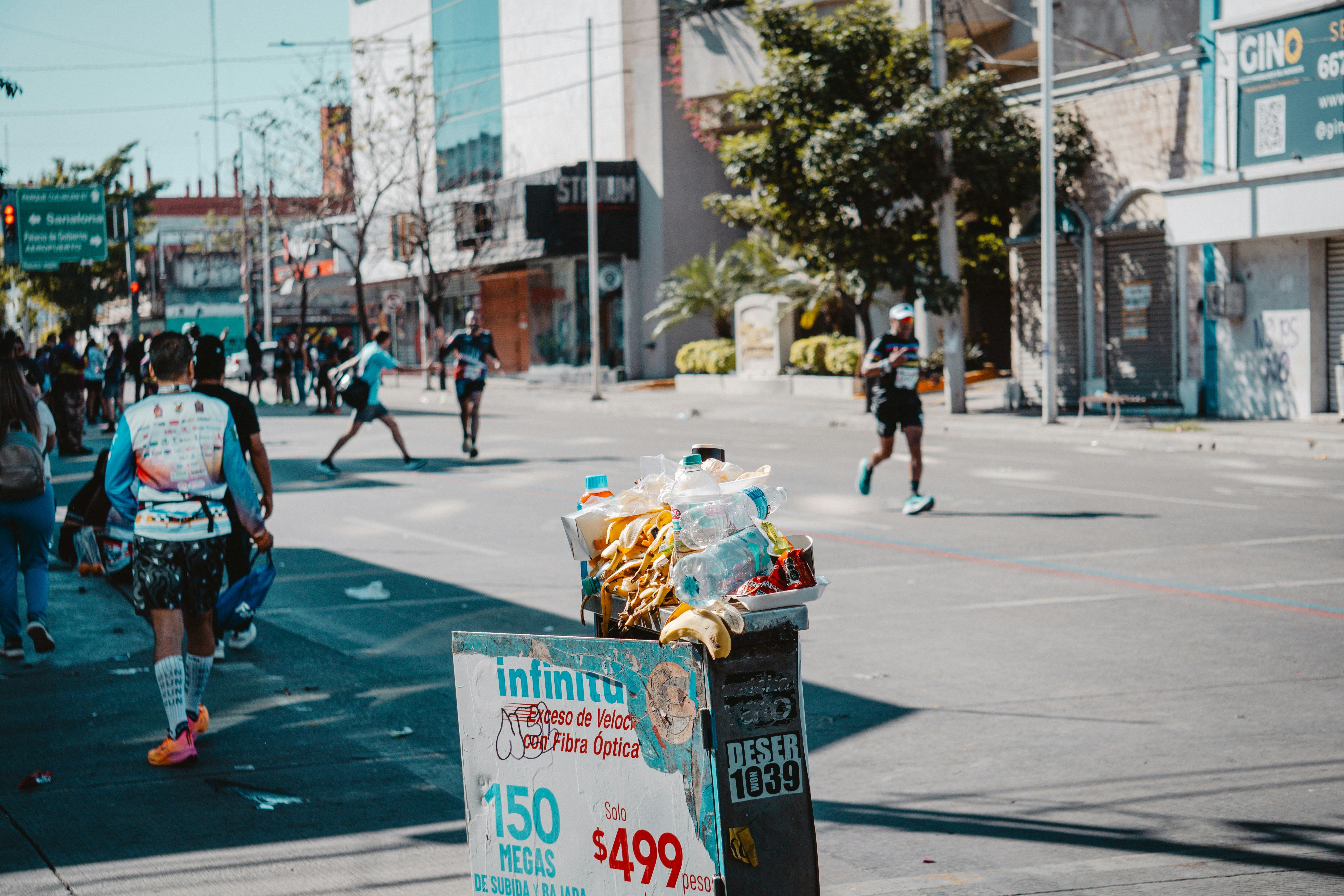 People running in a city street during a race.