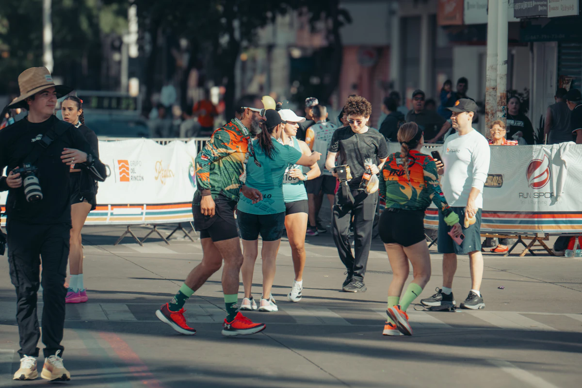 Runners celebrating at a finish line