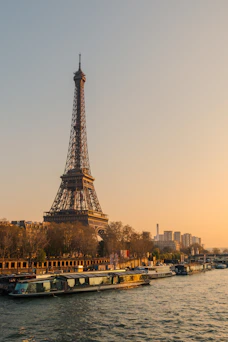 Eiffel tower and seine river at sunset