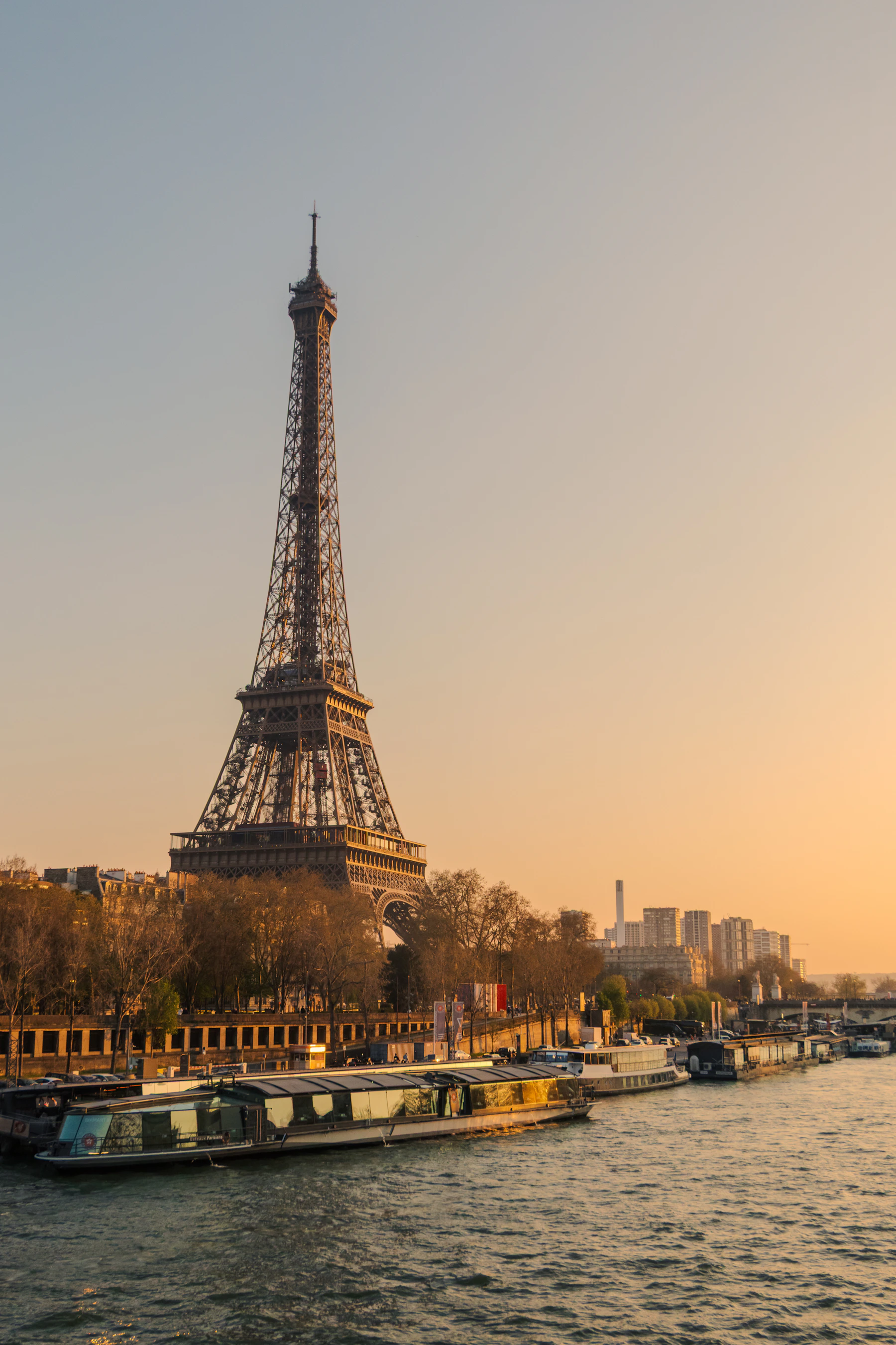 Eiffel Tower and Seine River in Paris at sunset