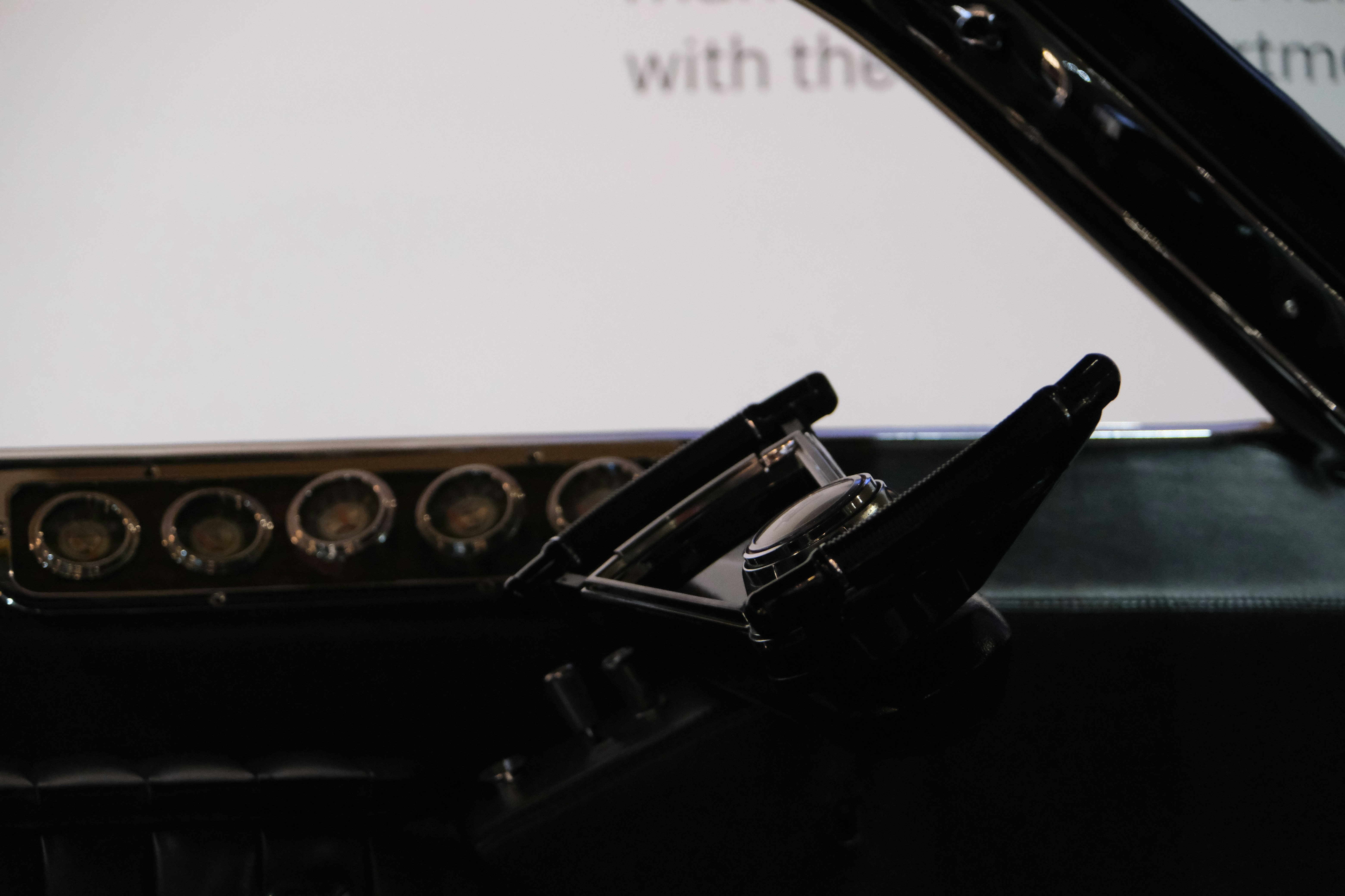 Vintage car dashboard with gauges and steering wheel