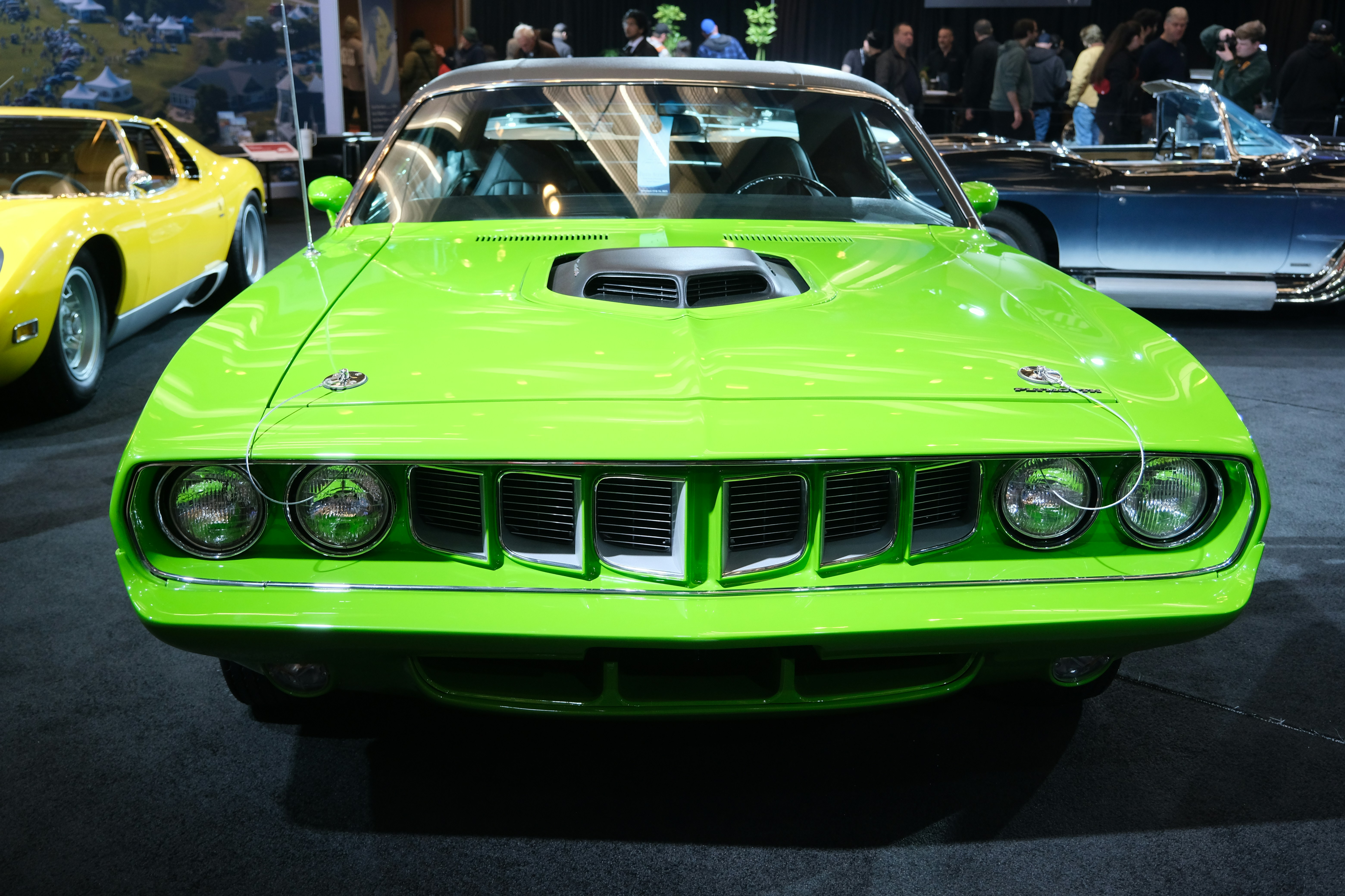 A bright green vintage muscle car