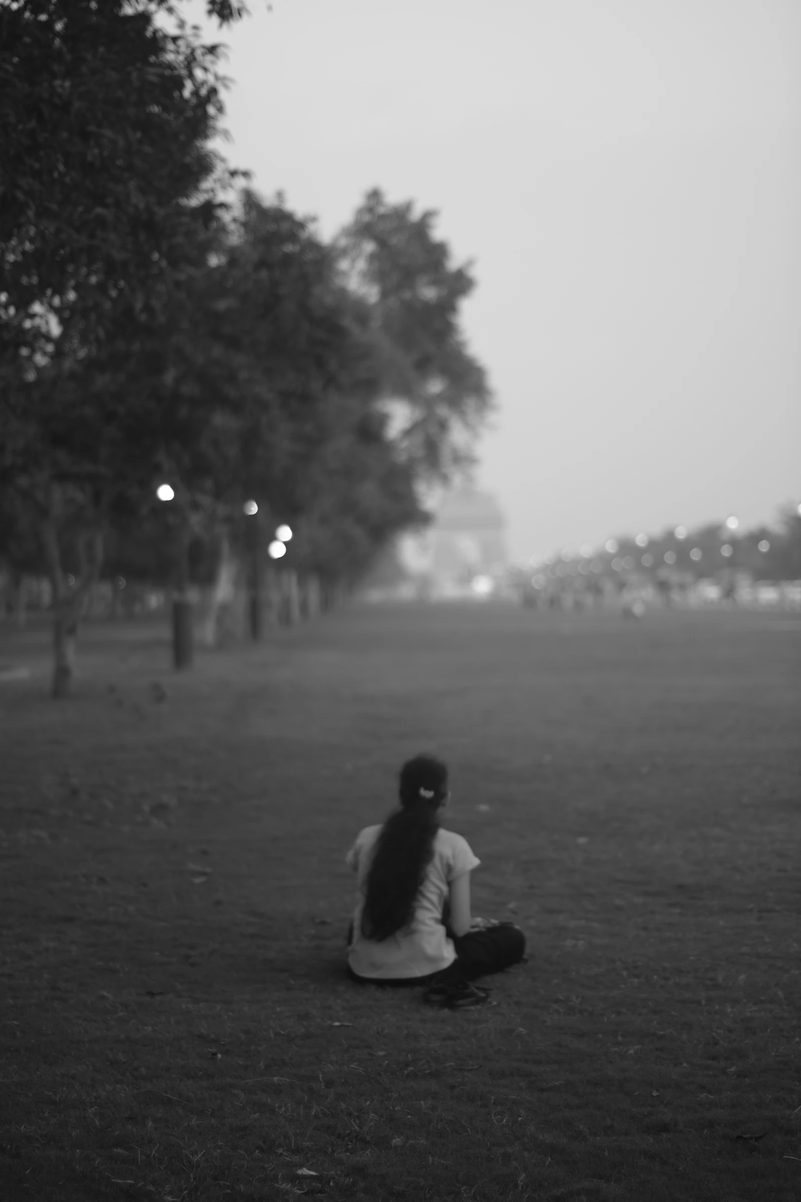 Woman sitting alone in quiet reflection while regaining clarity after relationship conflict
