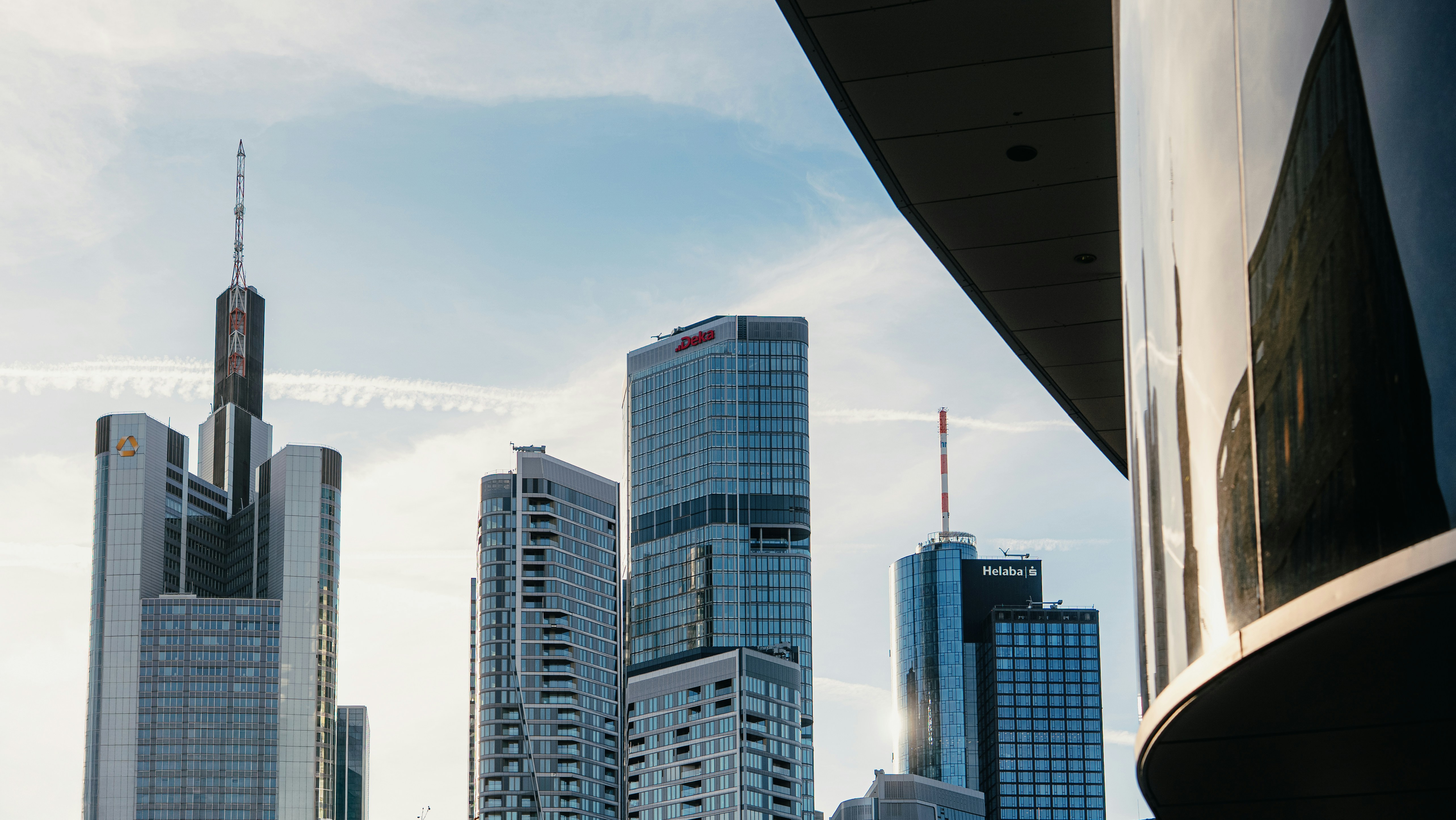 Modern skyscrapers under a bright blue sky