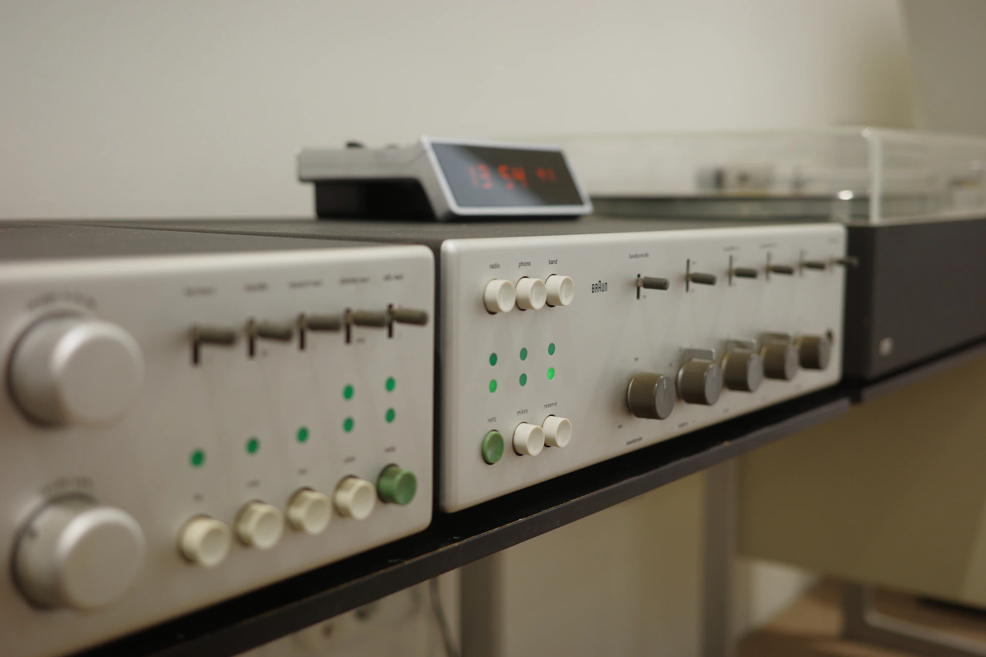 Vintage audio equipment stacked on a shelf