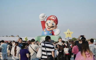 Giant inflatable mario character at an outdoor event
