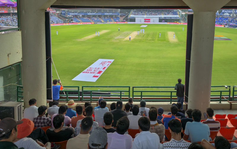 Spectators watching a cricket match in India