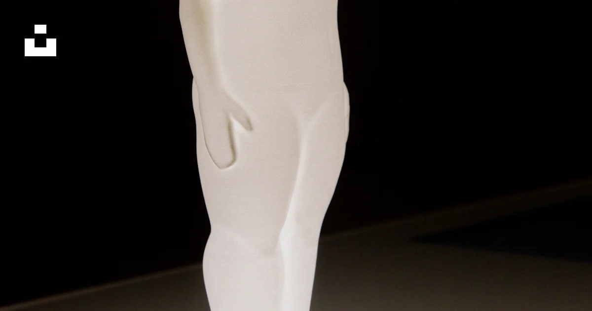 Strong Ranslucent Figure A translucent human sculpture glowing against a dark background. photo ...