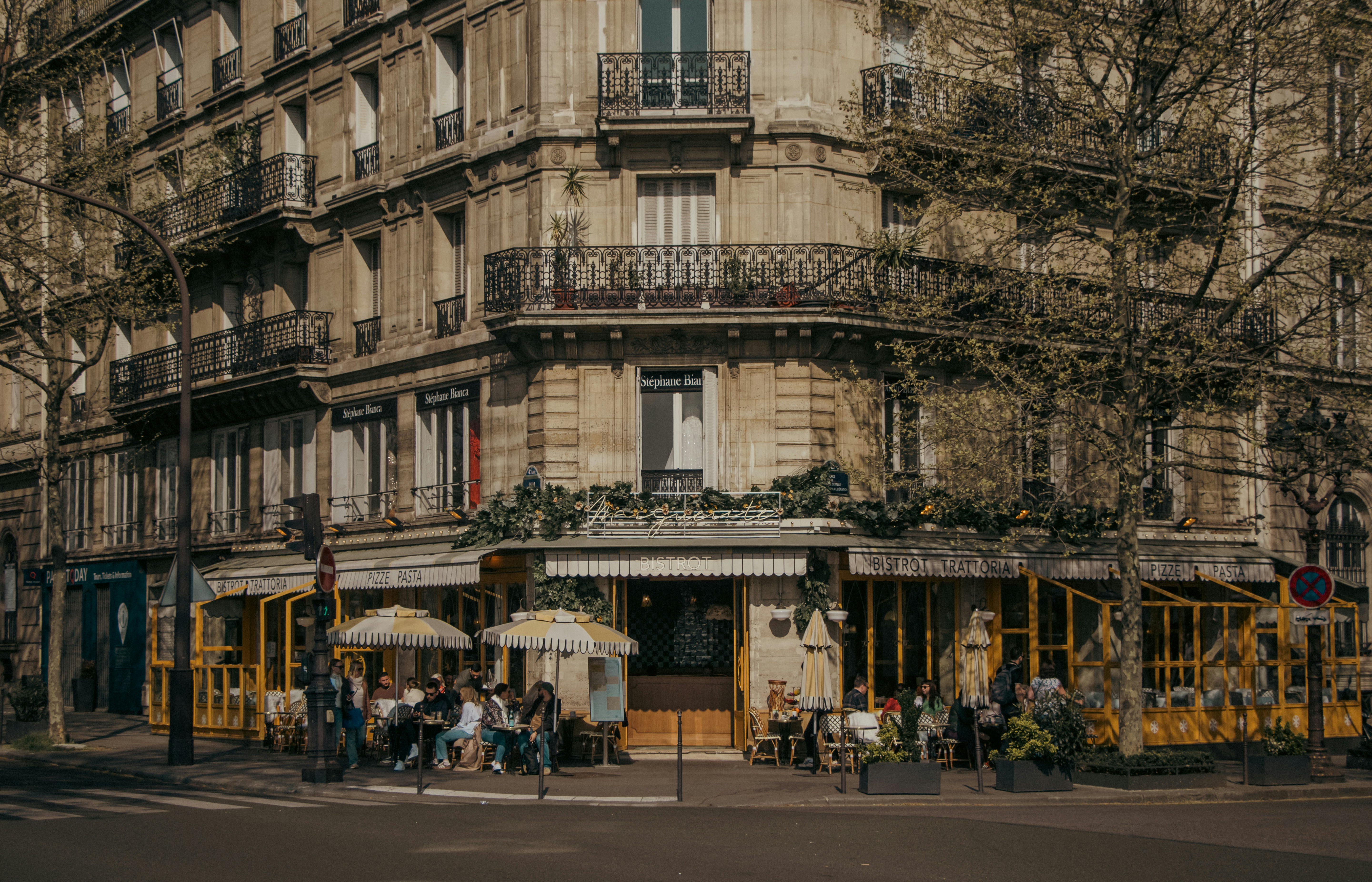 Corner cafe with outdoor seating in paris