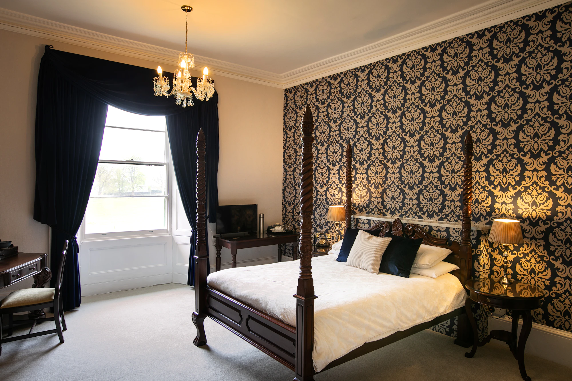 Beautifully wallpapered bedroom with premium accent wall