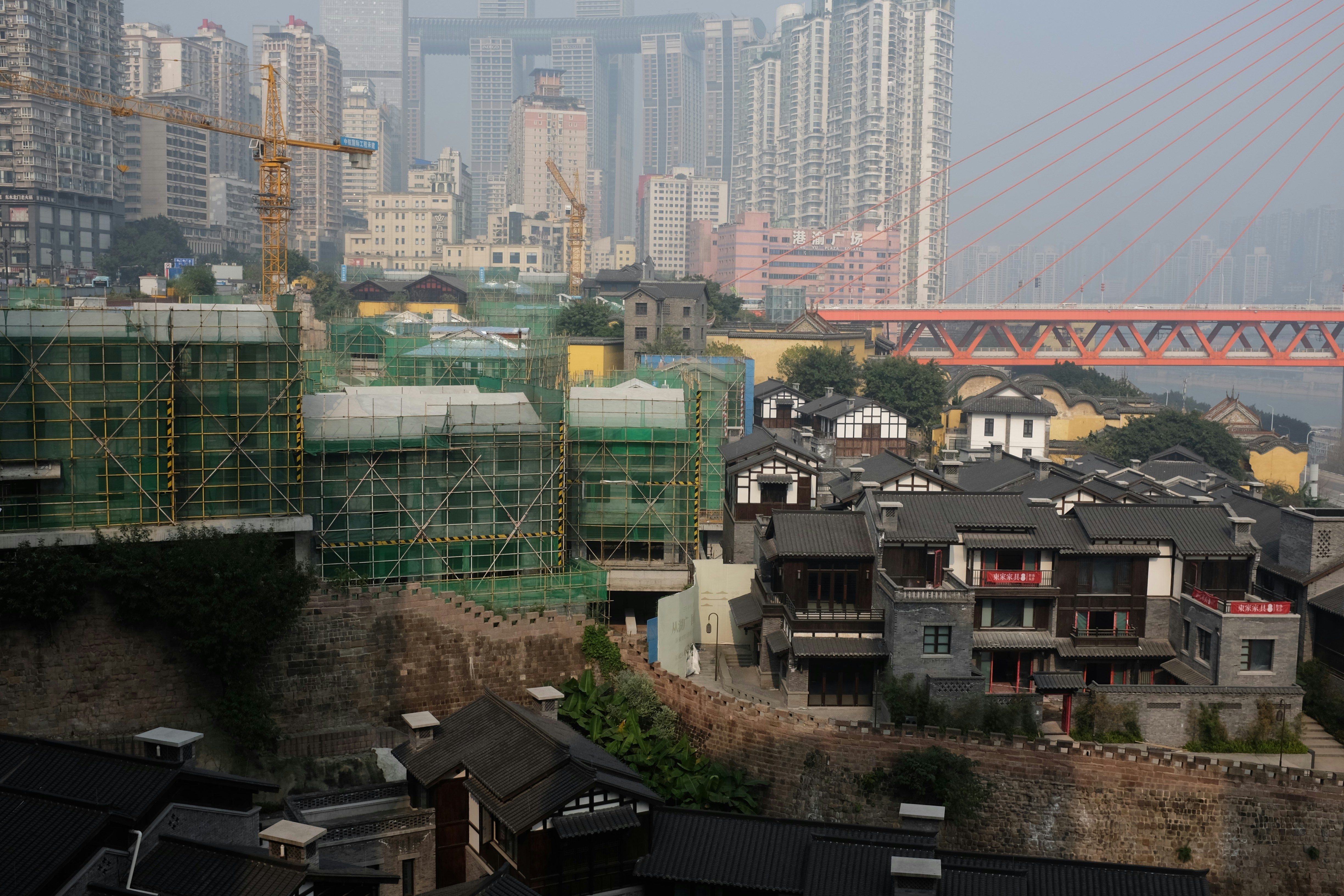 Cityscape with old buildings and construction in progress.