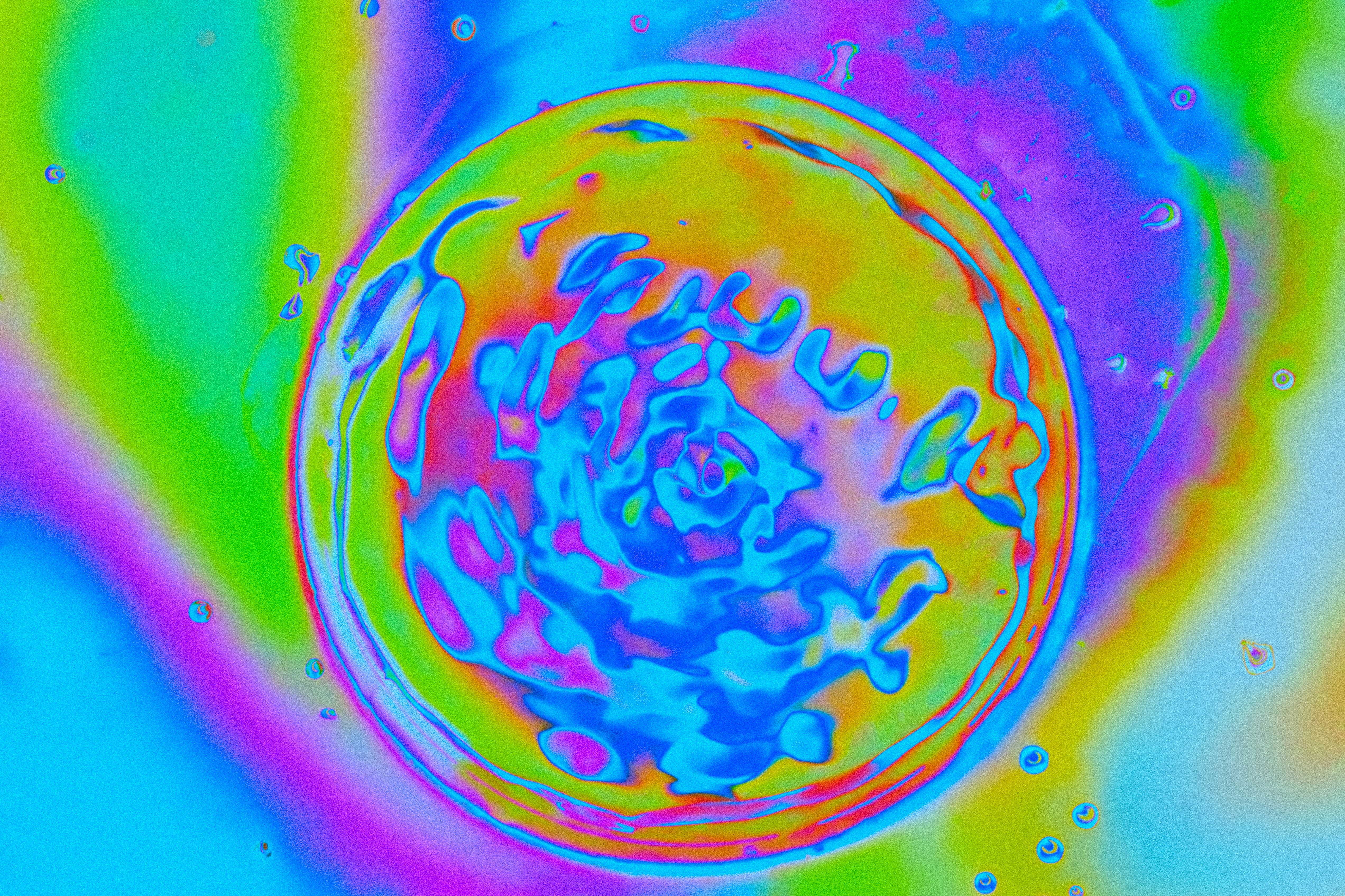 Vibrant abstract swirl in a colorful, psychedelic background.
