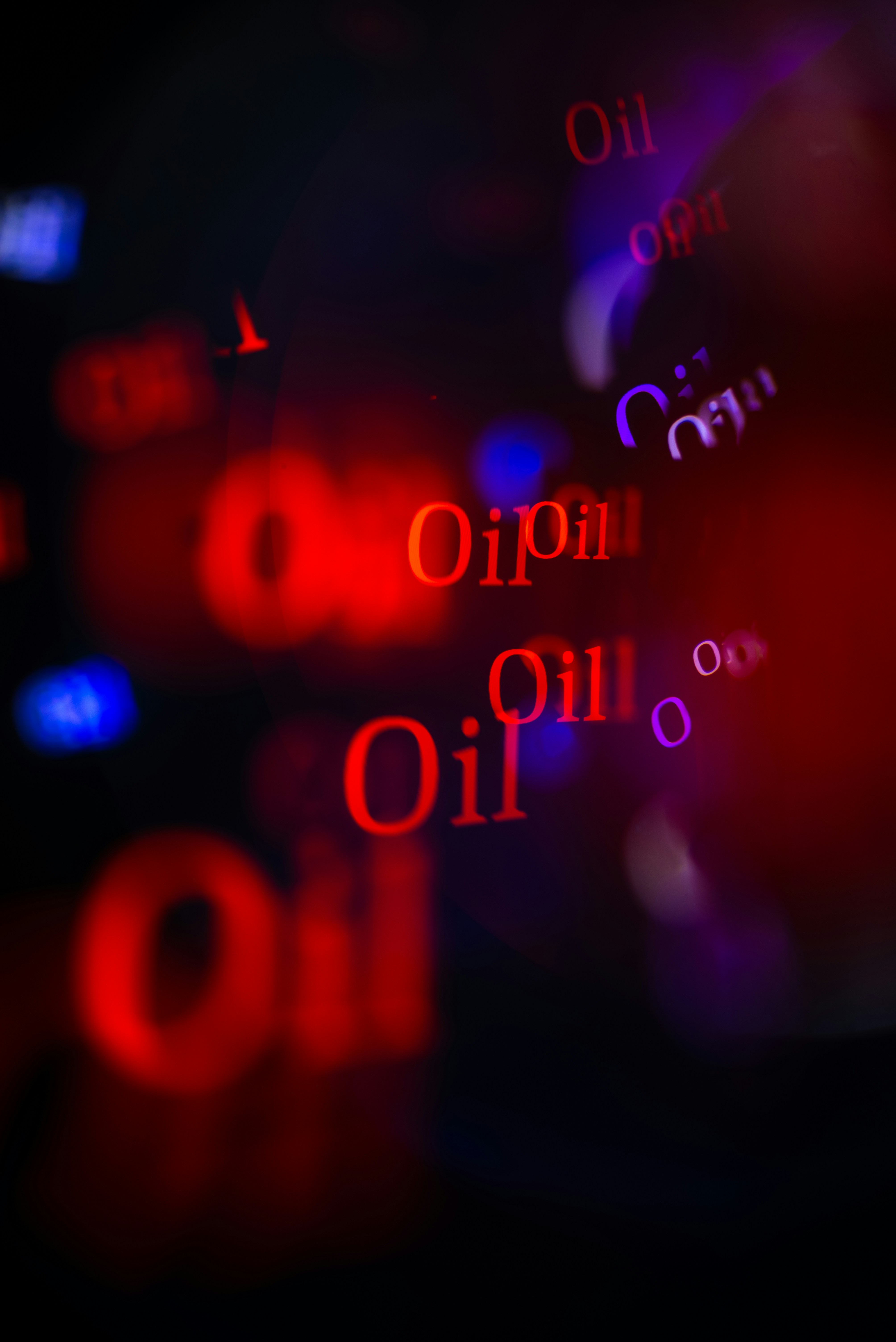 Red illuminated "oil" warning light on dashboard