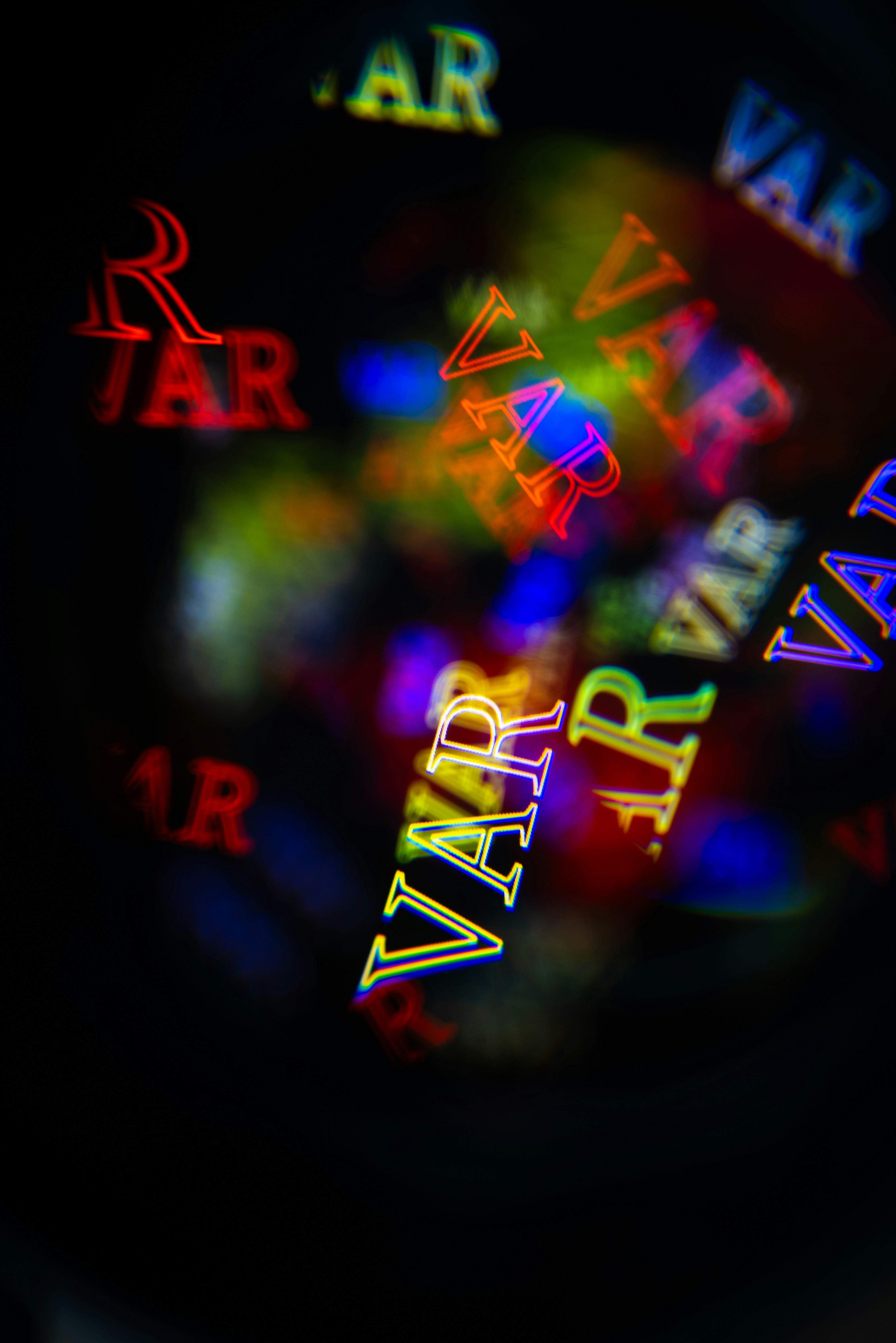 Blurred colorful bokeh lights with the word var