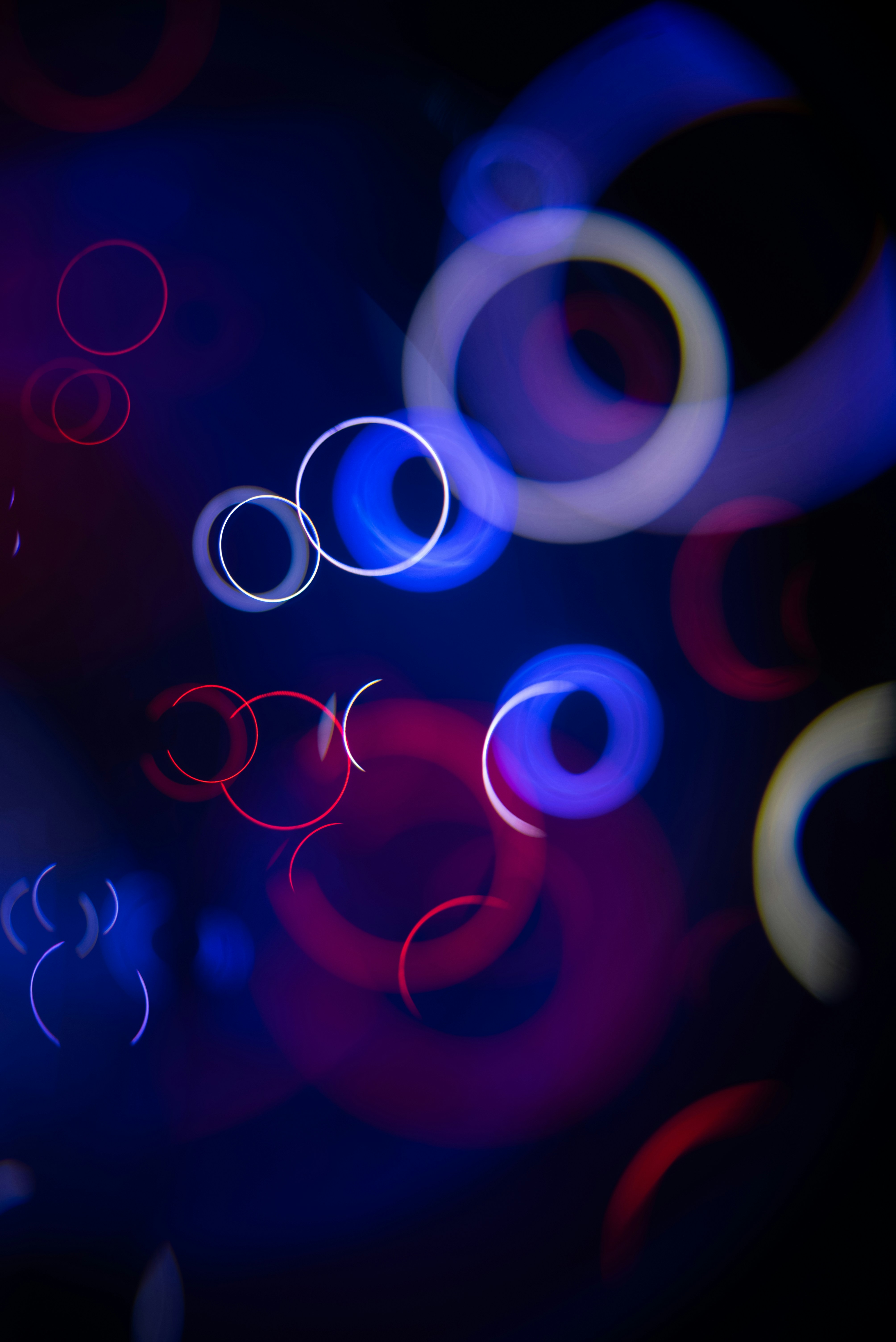 Abstract bokeh circles in blue and red light