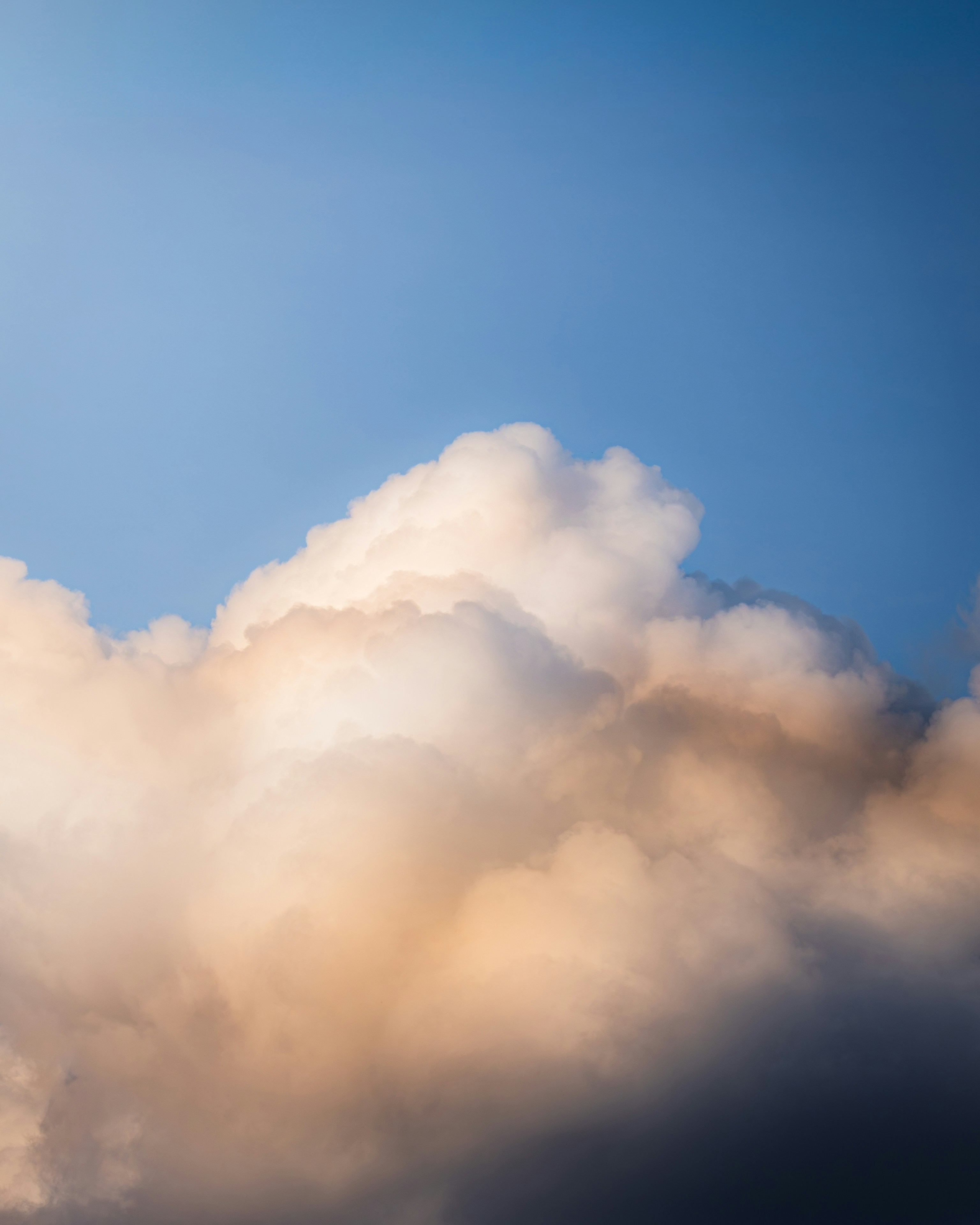 Dramatic clouds illuminated by the setting sun