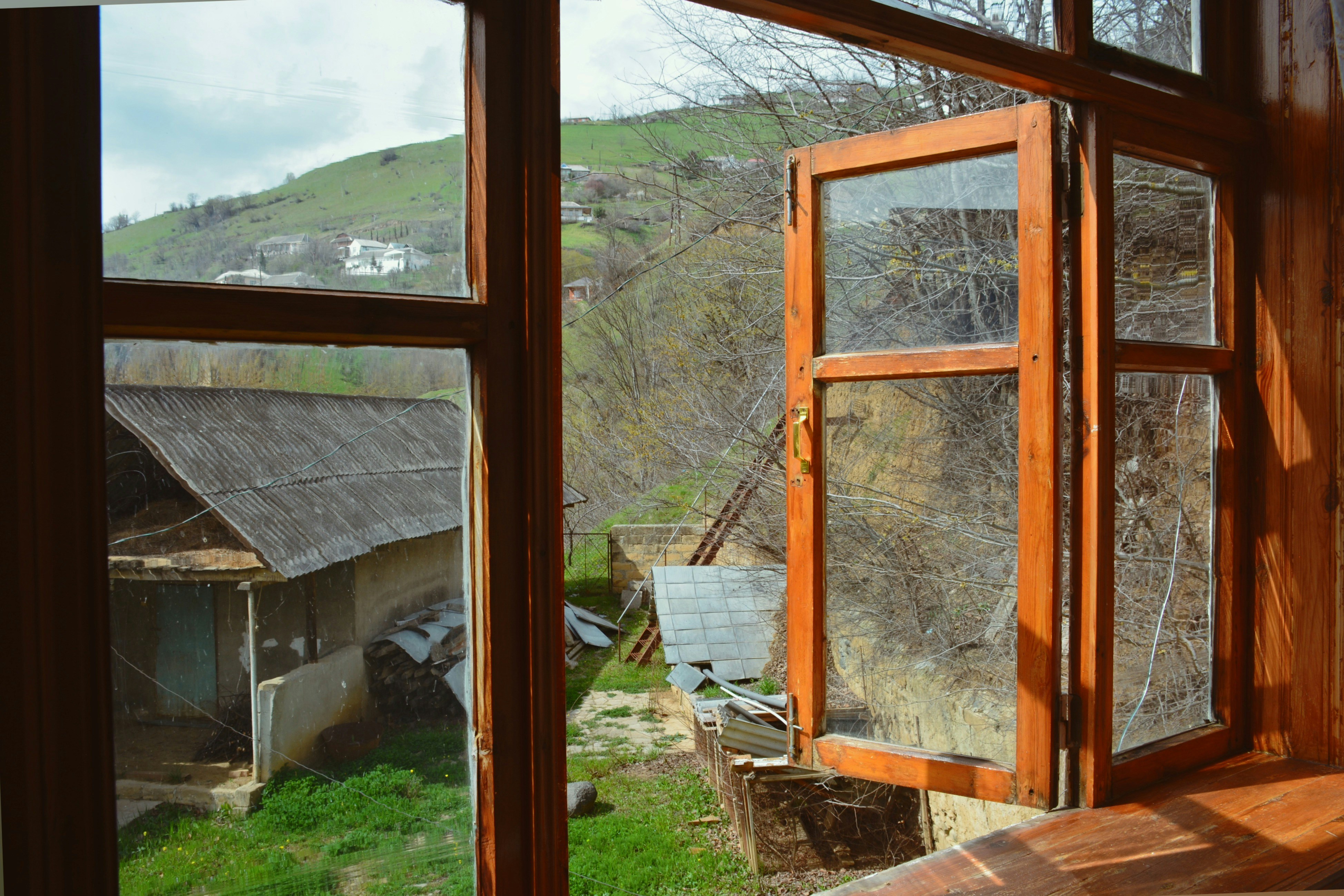 View through a wooden window of a rural landscape photo – Free Spring ...