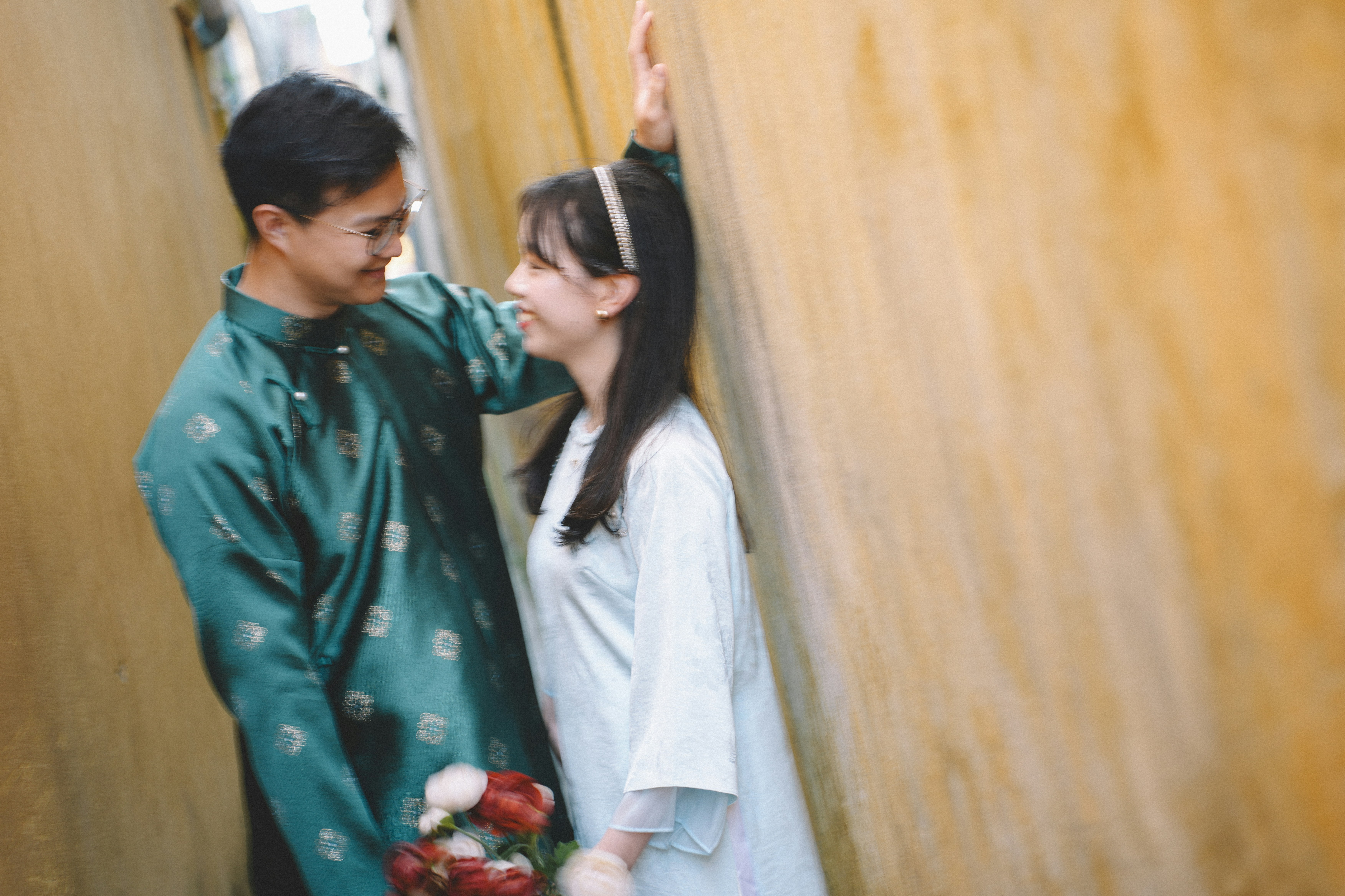 Couple in traditional clothing looking at each other photo – Free ...
