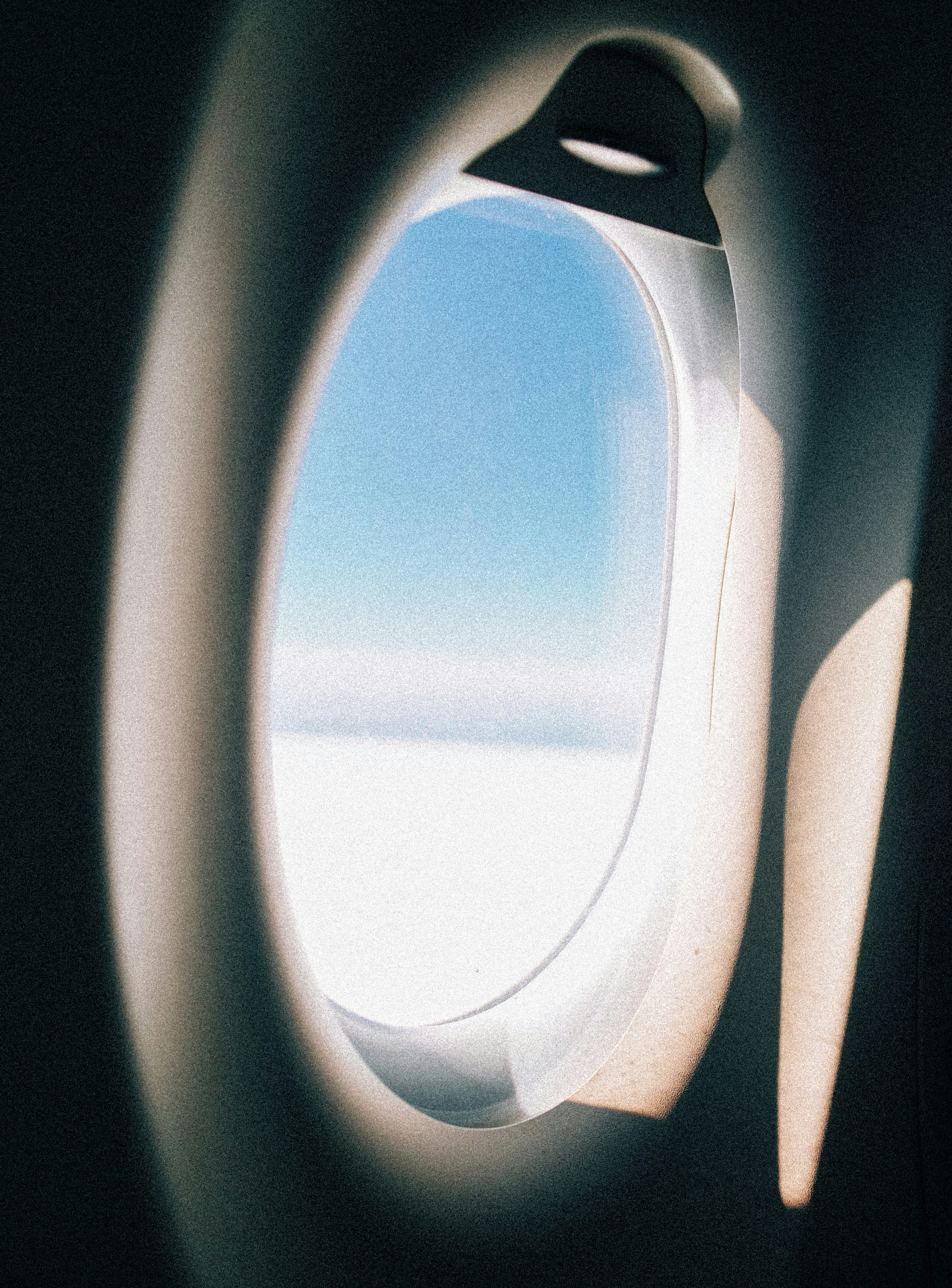 View of sky through airplane window