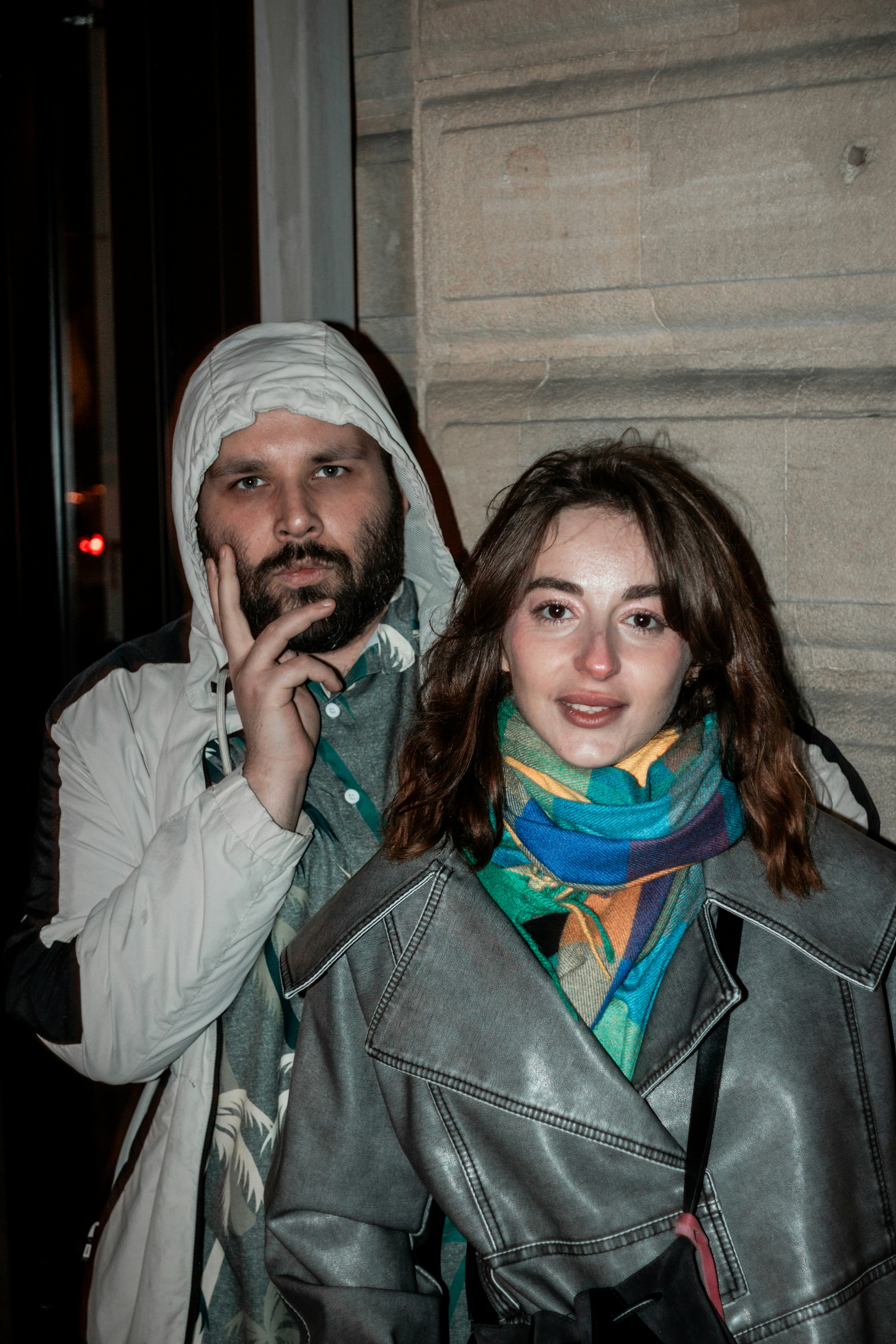 A man and a woman standing together outdoors