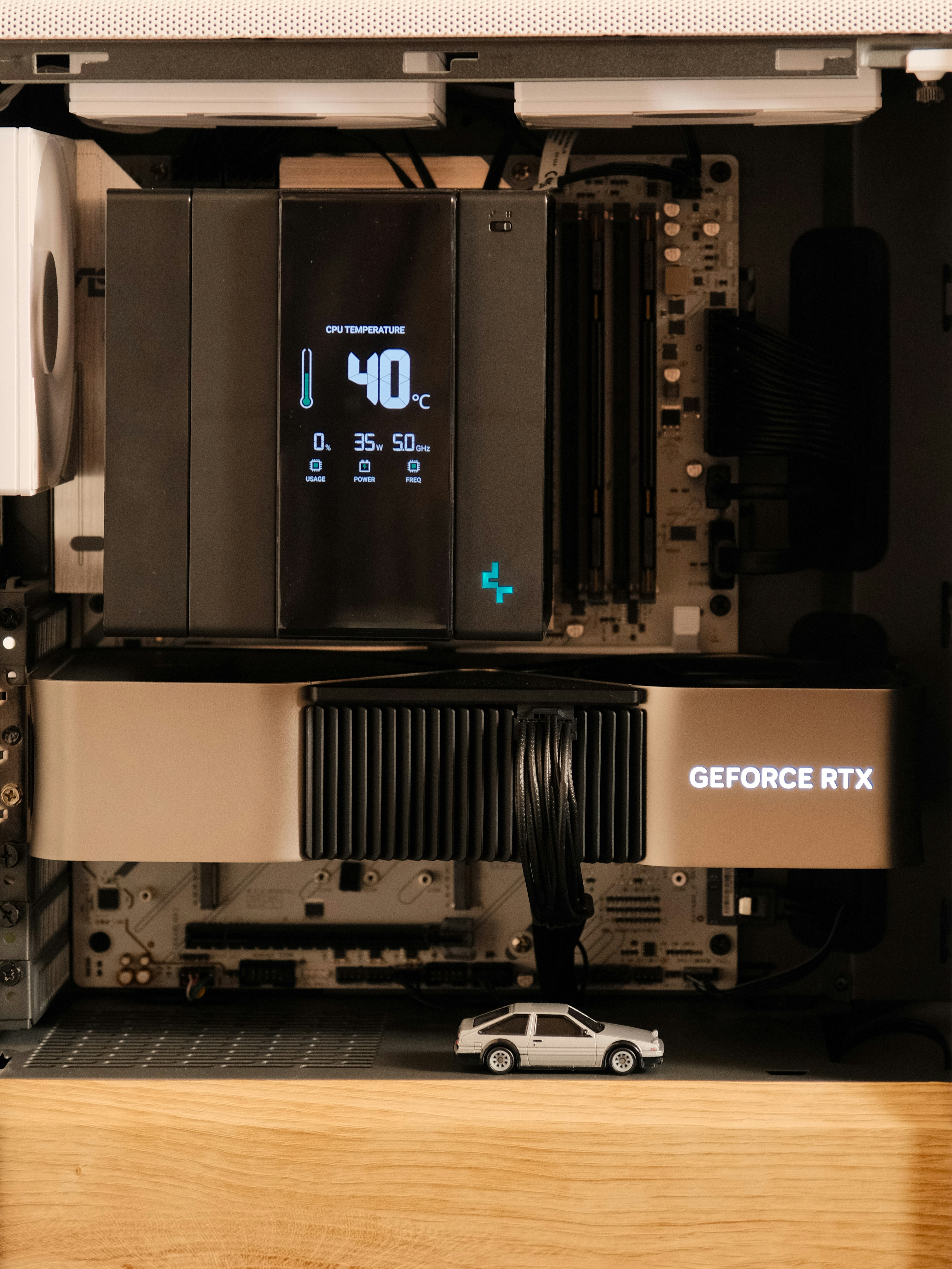 Computer components with a small toy car
