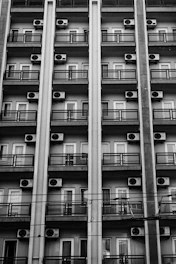 Rows of air conditioning units on a building facade
